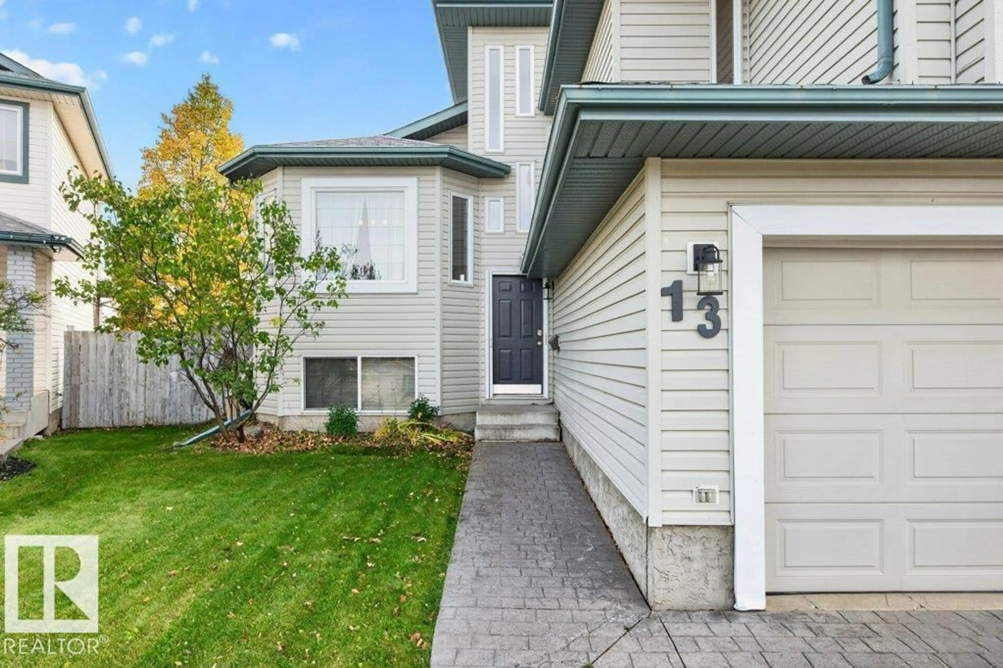 Home with vinyl exterior material, street for 13 HARVEST CO, St. Albert Alberta T8N6W8