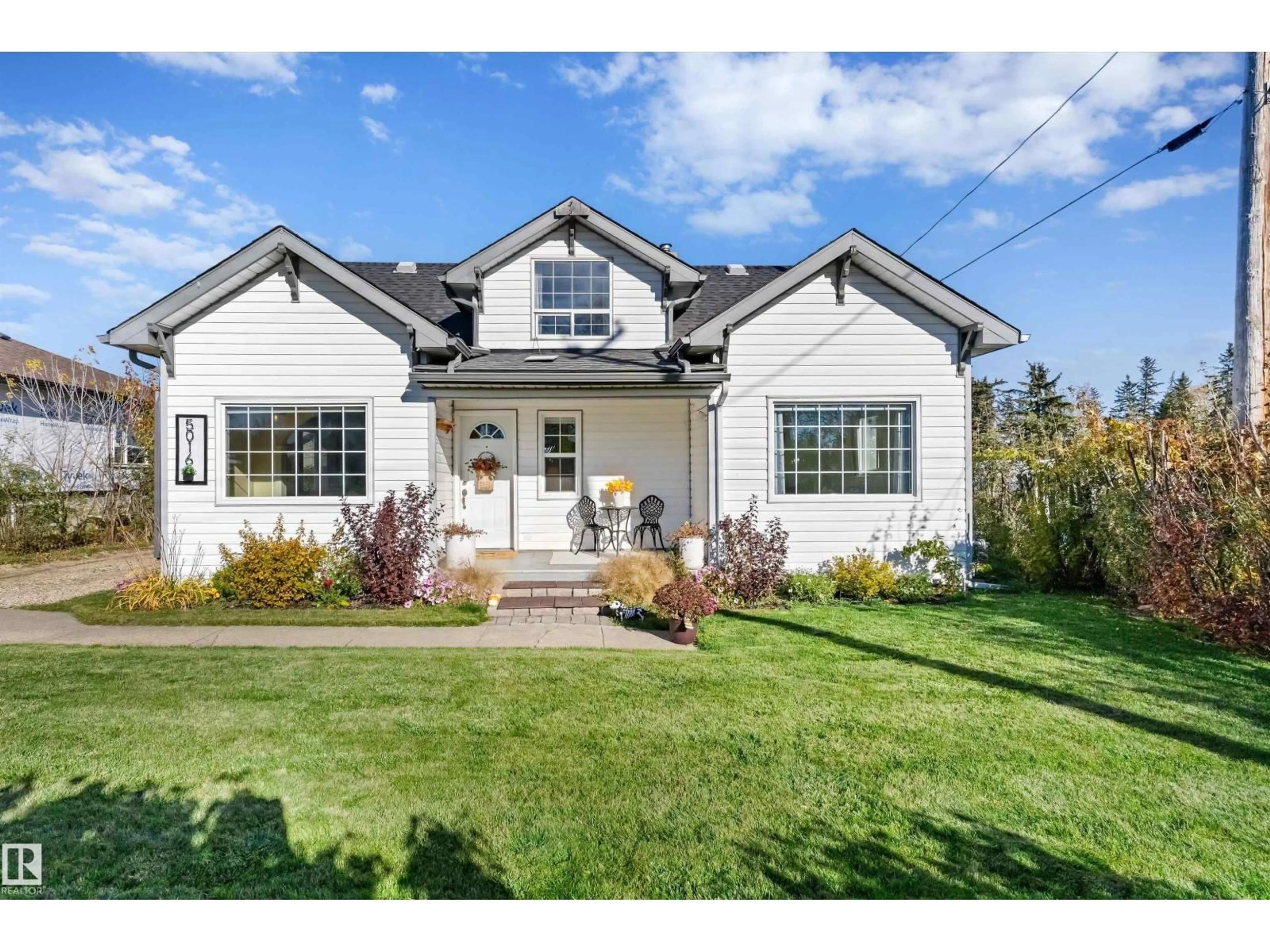 Home with vinyl exterior material, street for 5016 52 AV, Warburg Alberta T0C2T0
