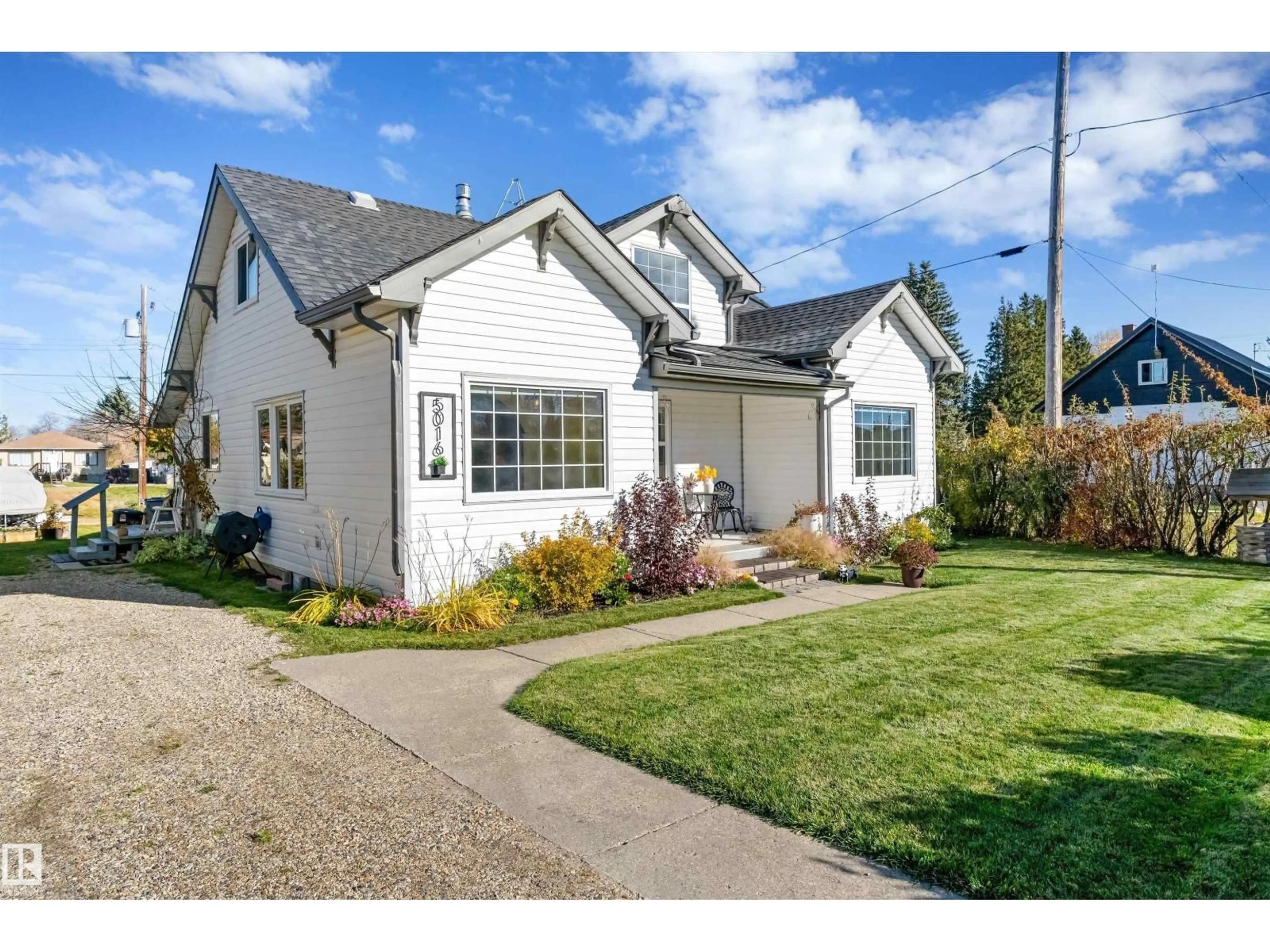 Home with vinyl exterior material, street for 5016 52 AV, Warburg Alberta T0C2T0