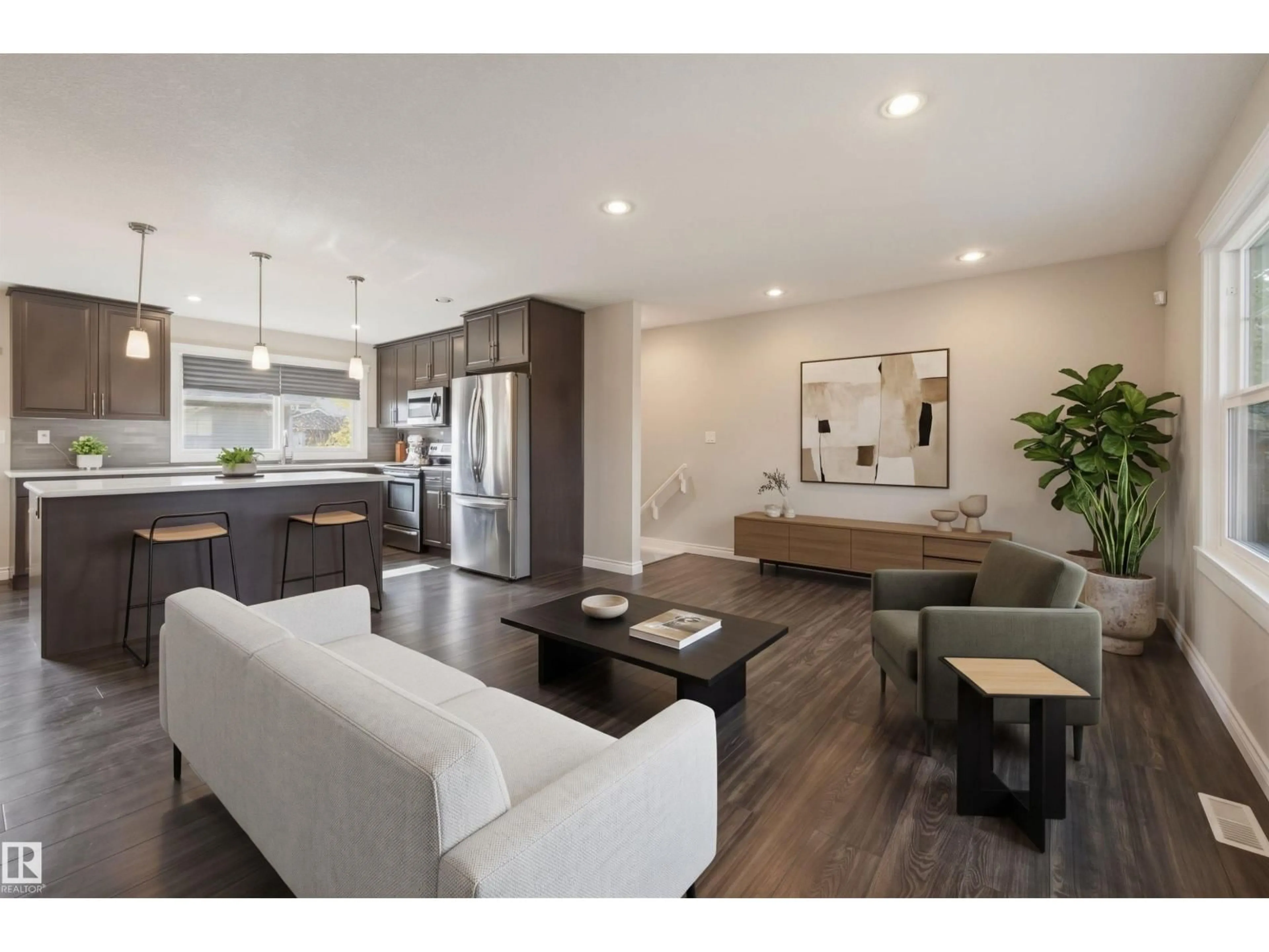 Open concept kitchen, wood/laminate floor for 13919 119 AV, Edmonton Alberta T5L2N7
