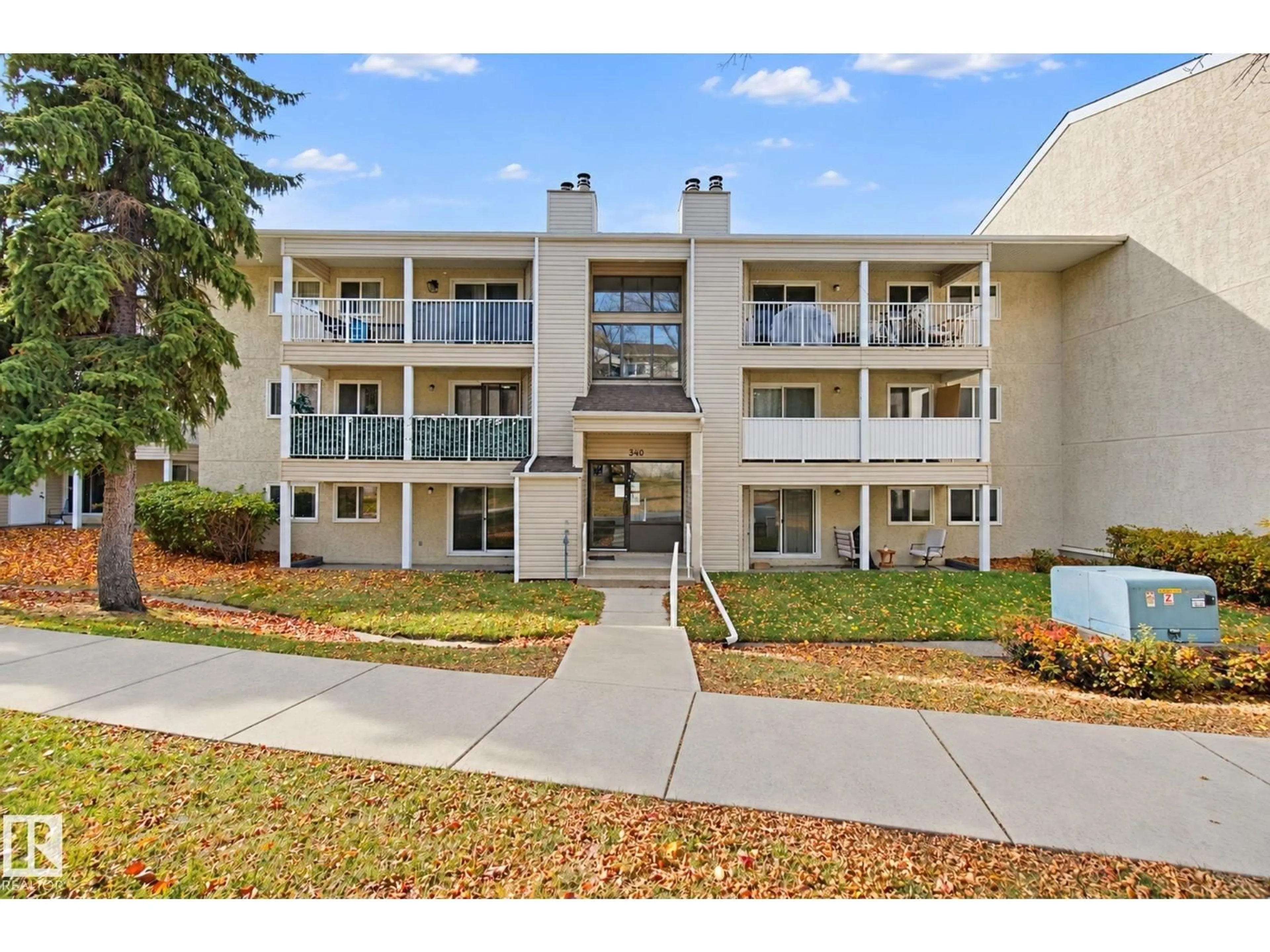A pic from outside/outdoor area/front of a property/back of a property/a pic from drone, unknown for #101 - 340 WOODBRIDGE WY, Sherwood Park Alberta T8A4G3