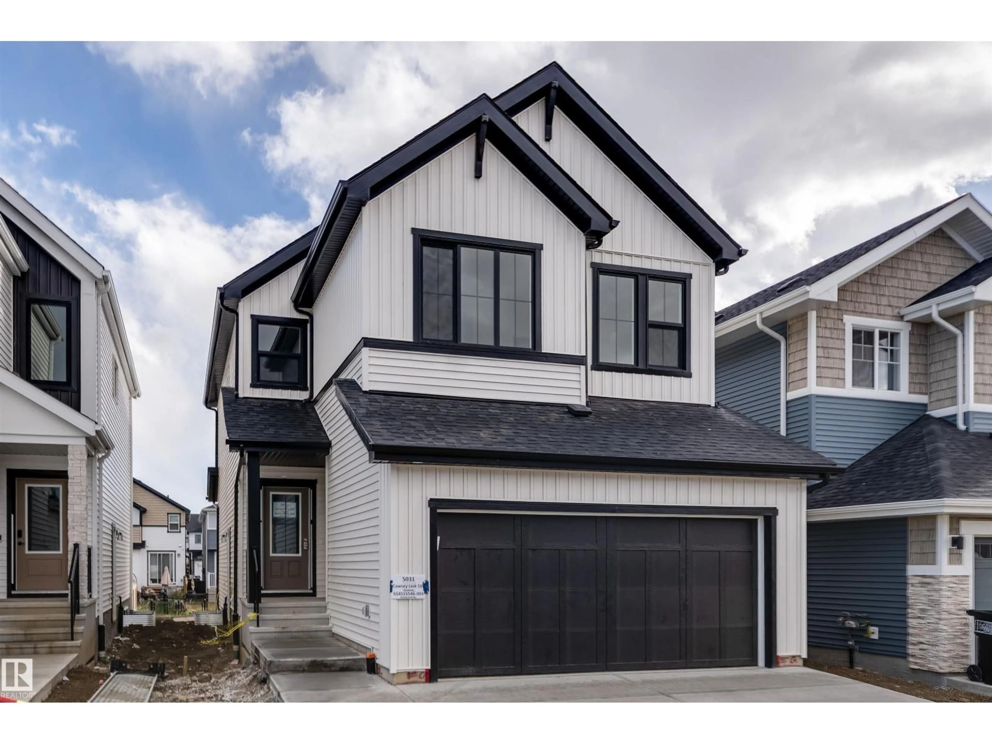 Home with vinyl exterior material, street for SW - 5031 CAWSEY LI, Edmonton Alberta T6W5Y6