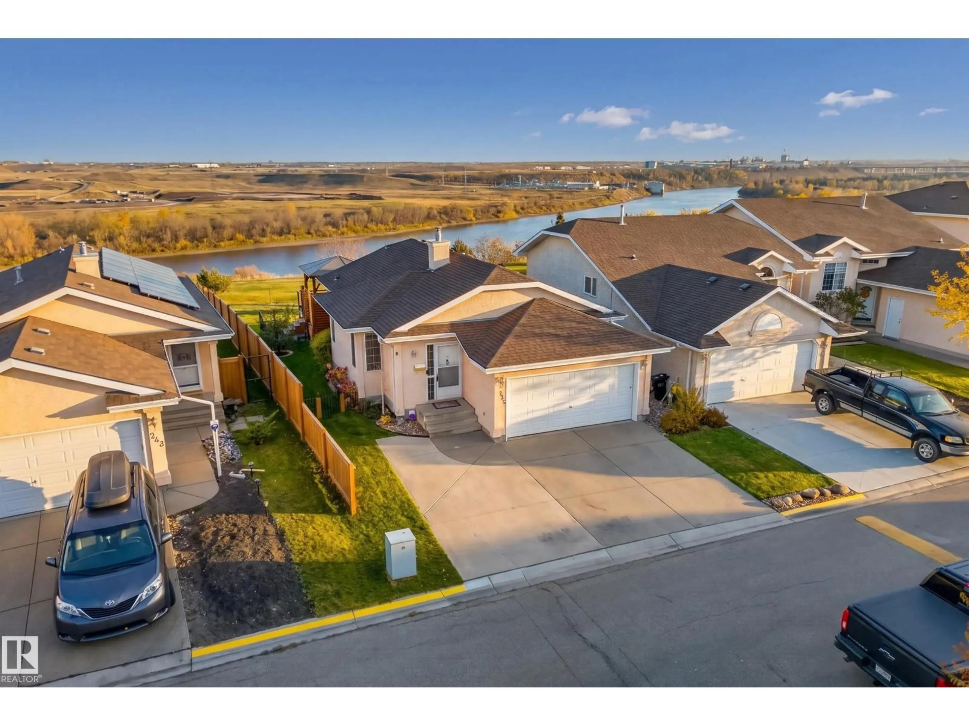 A pic from outside/outdoor area/front of a property/back of a property/a pic from drone, water/lake/river/ocean view for 245 RIVER PT NW, Edmonton Alberta T5A4Z2