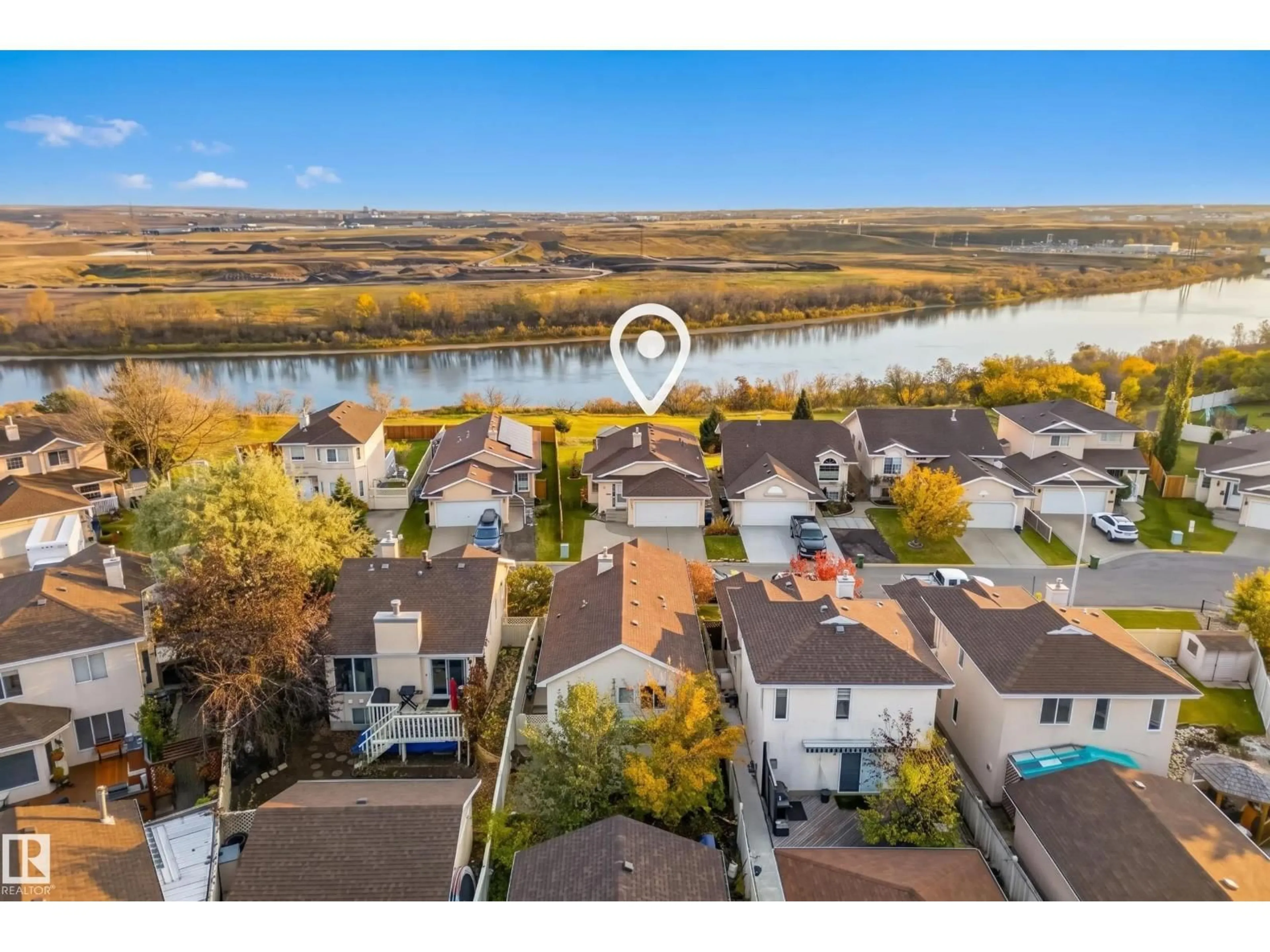A pic from outside/outdoor area/front of a property/back of a property/a pic from drone, water/lake/river/ocean view for 245 RIVER PT NW, Edmonton Alberta T5A4Z2