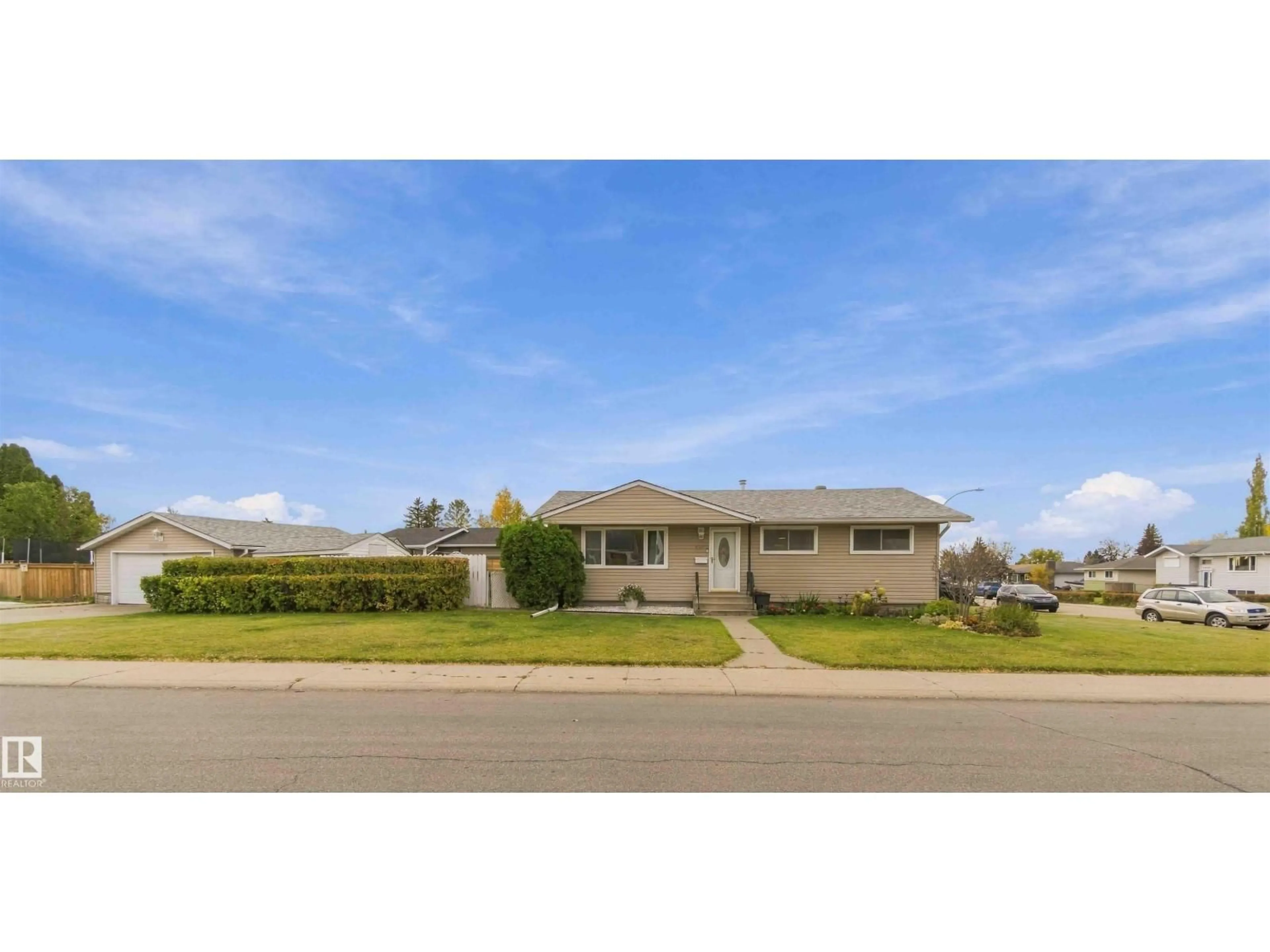 Home with vinyl exterior material, street for 6207 146 AV, Edmonton Alberta T5A1T2