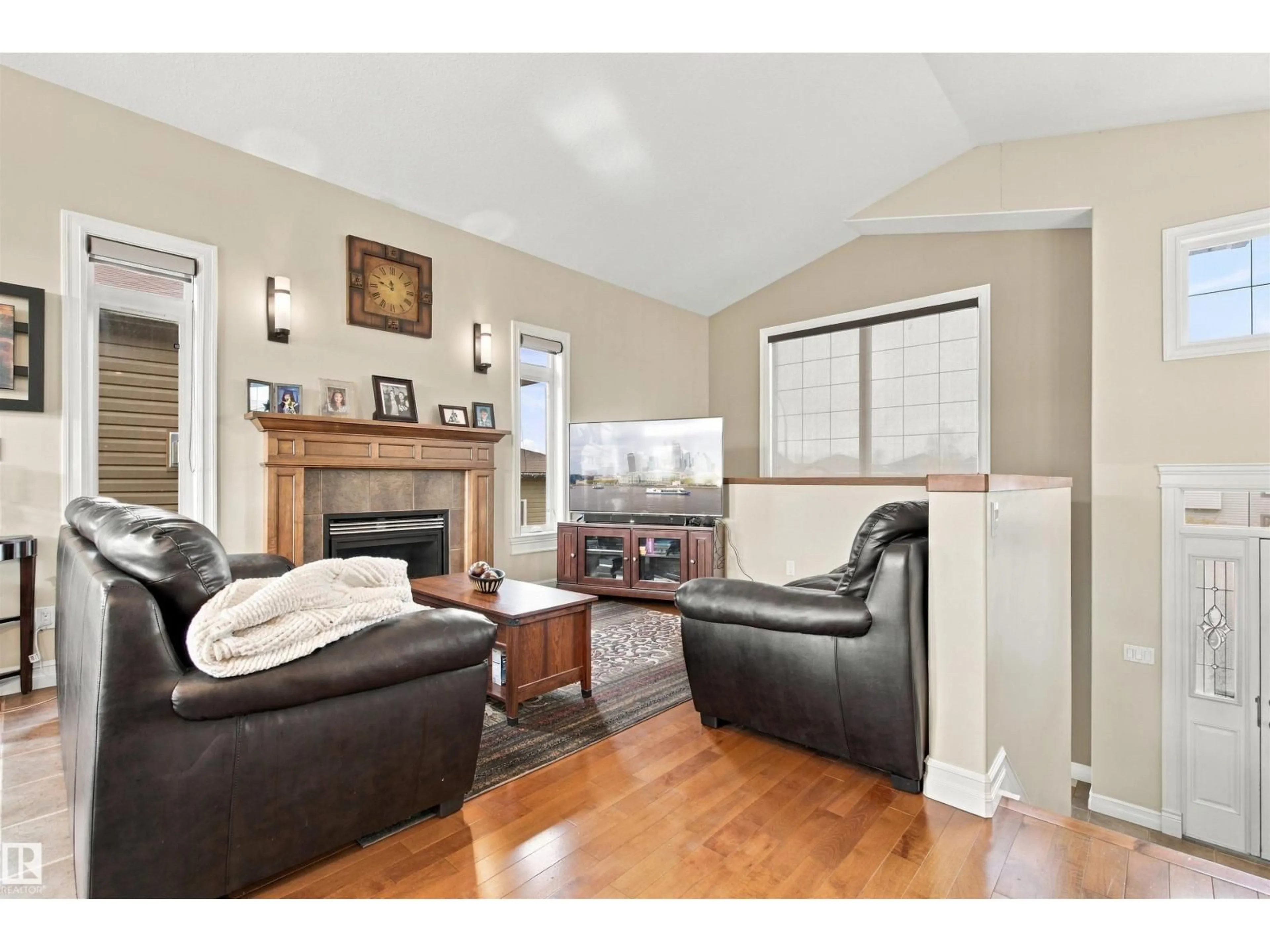 Living room with furniture, wood/laminate floor for 4923 59 AV, Cold Lake Alberta T9M0C2