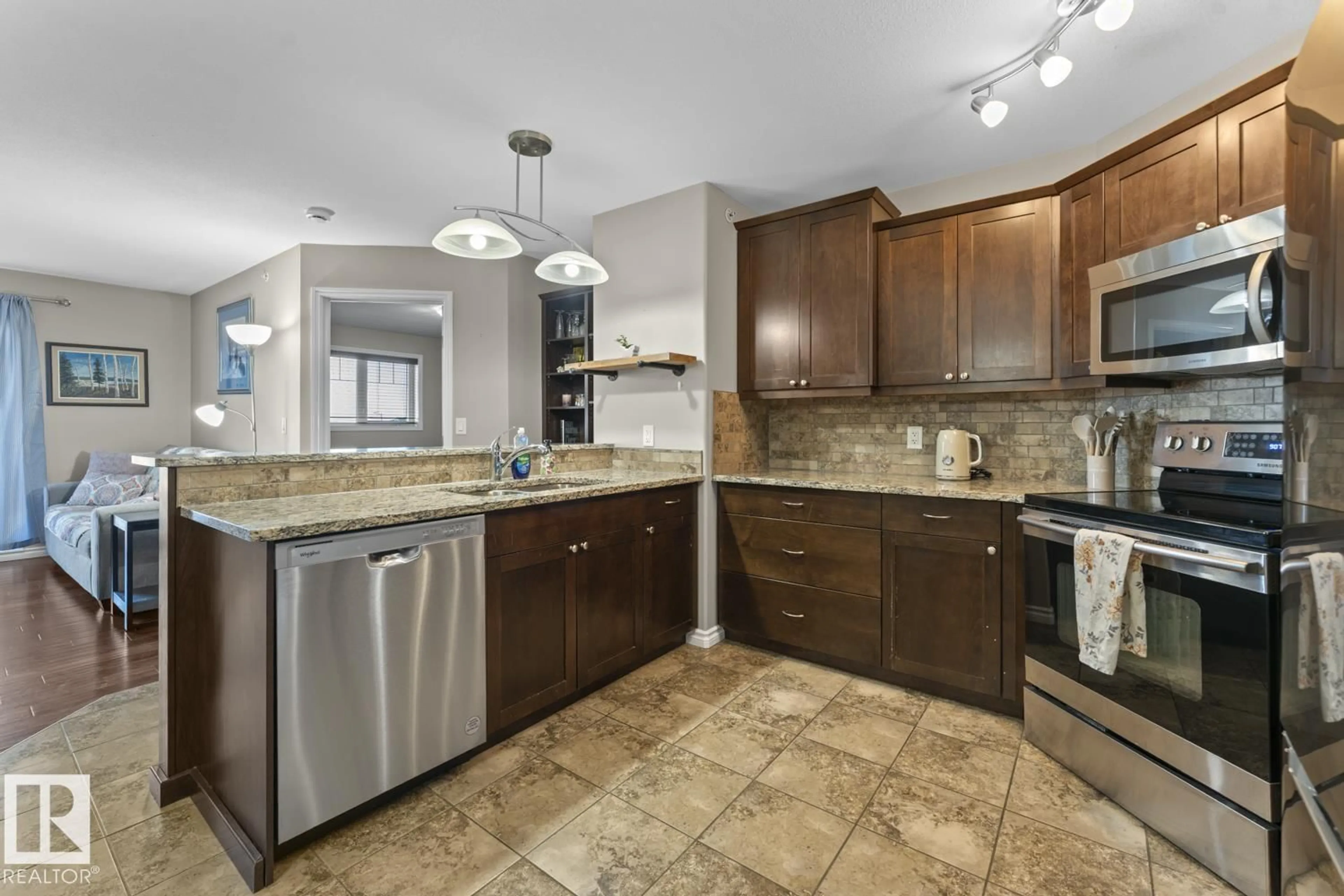 Open concept kitchen, ceramic/tile floor for 901 - 3407 16 ST, Cold Lake Alberta T9M1K1