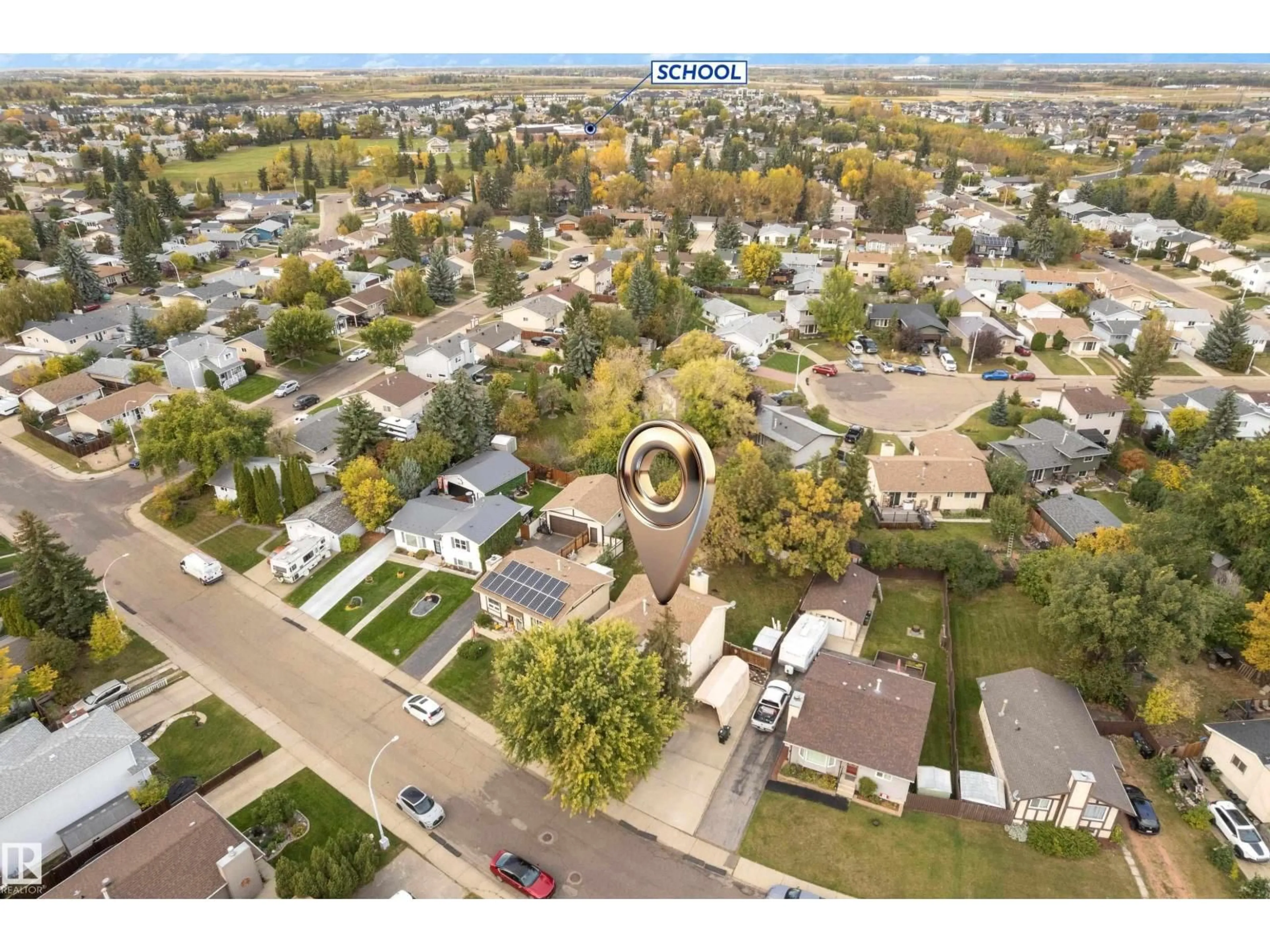 A pic from outside/outdoor area/front of a property/back of a property/a pic from drone, street for 1920 145 AV, Edmonton Alberta T5Y1V3