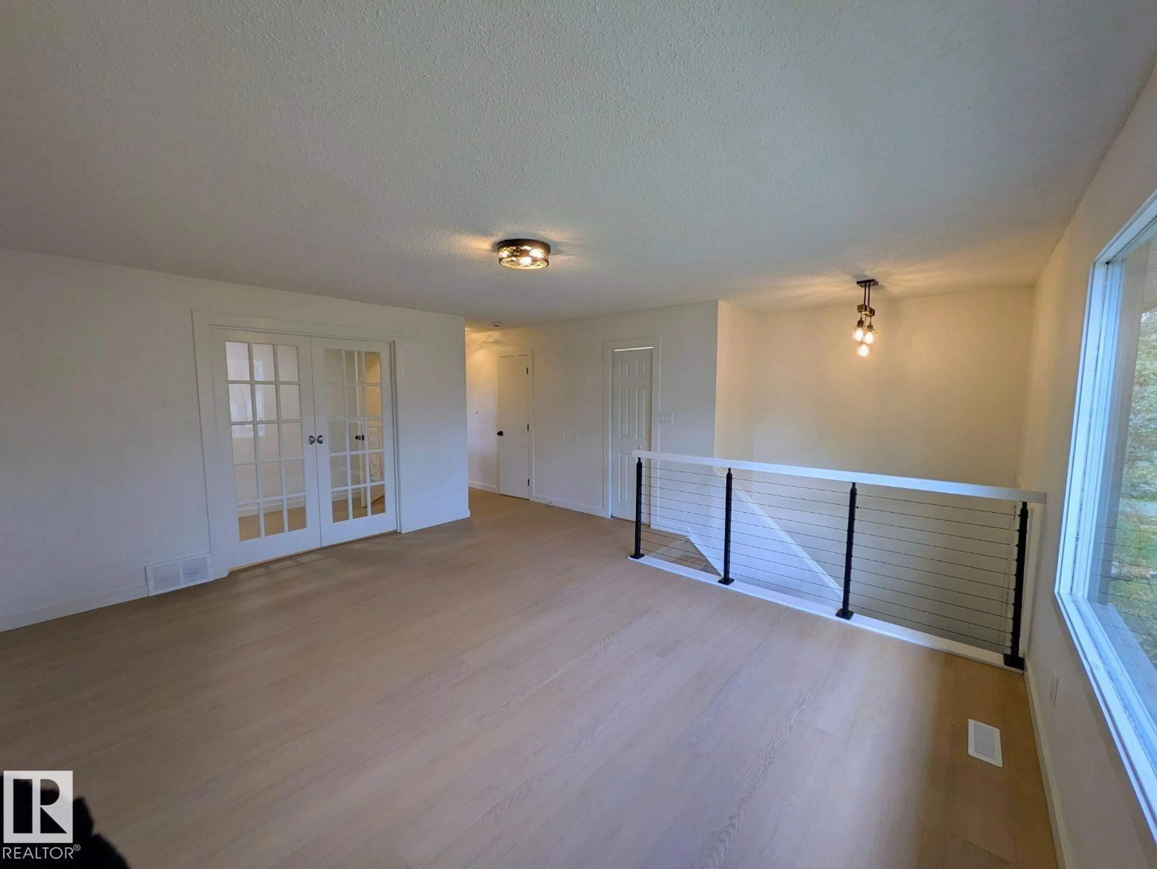 A pic of a room for 12716 125 ST, Edmonton Alberta T5L0T7