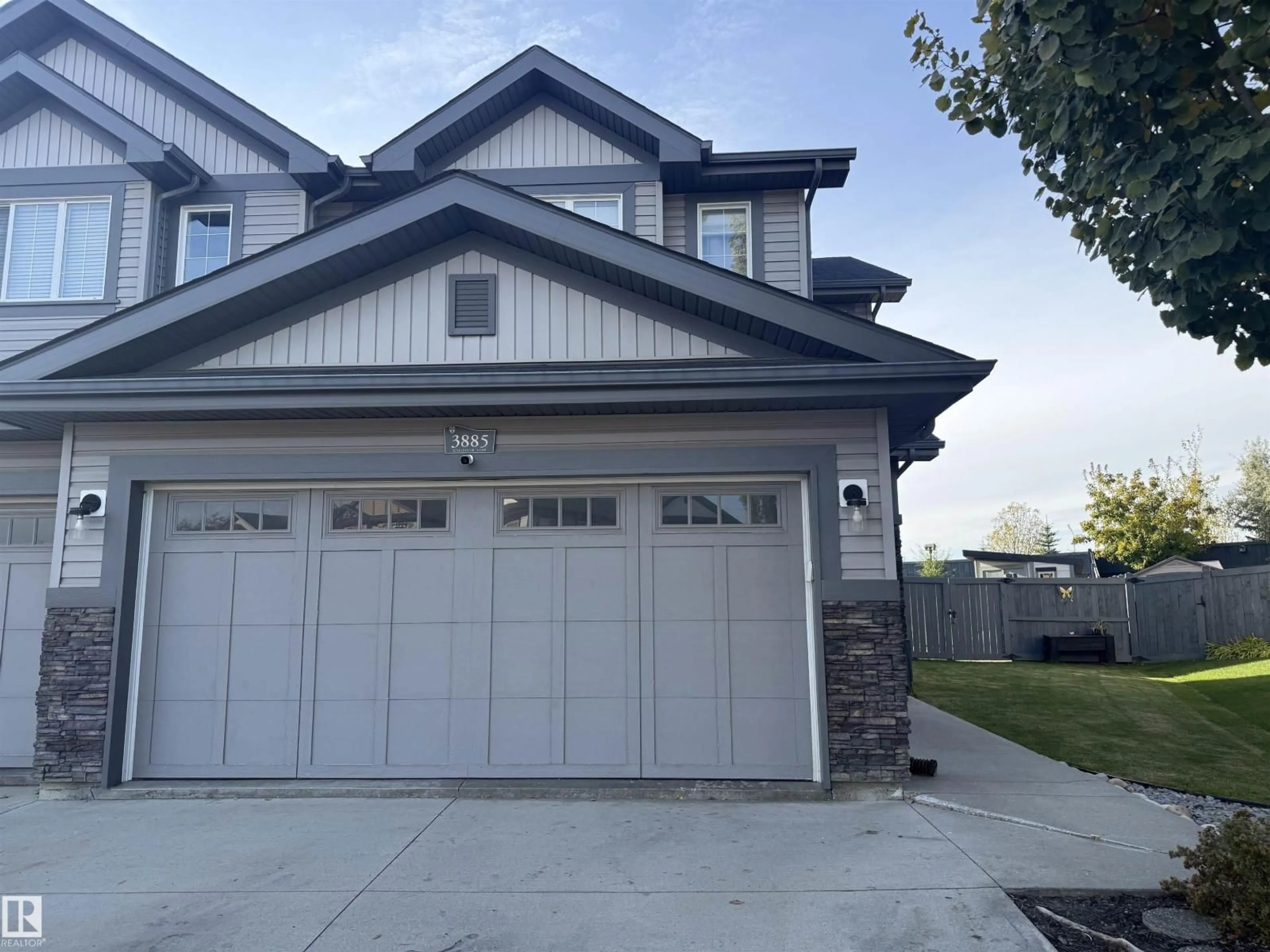Home with vinyl exterior material, street for NW - 3885 GALLINGER LO, Edmonton Alberta T5T4G6
