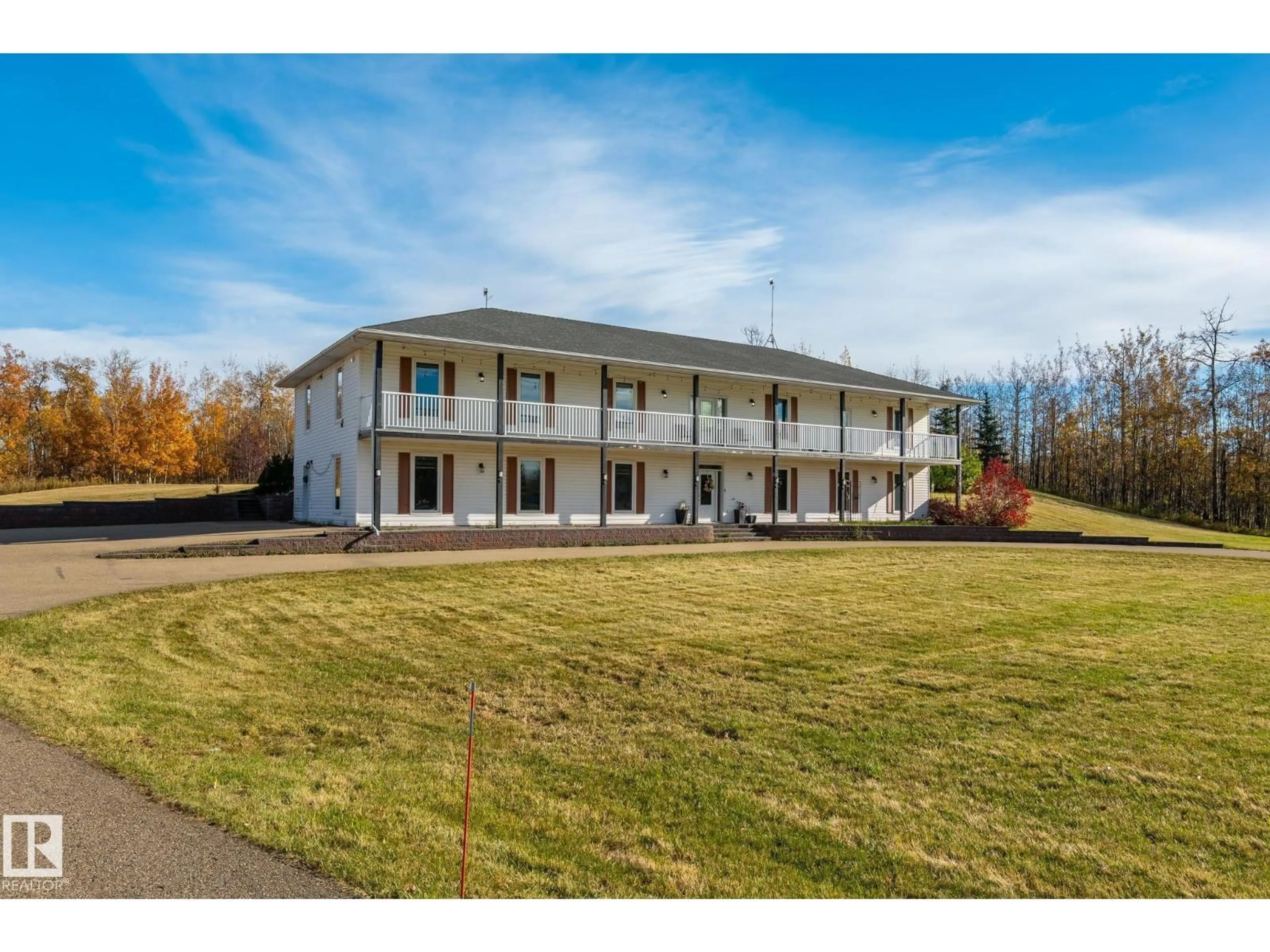A pic from outside/outdoor area/front of a property/back of a property/a pic from drone, building for 23450 TWP RD 505, Rural Leduc County Alberta T4X0S1