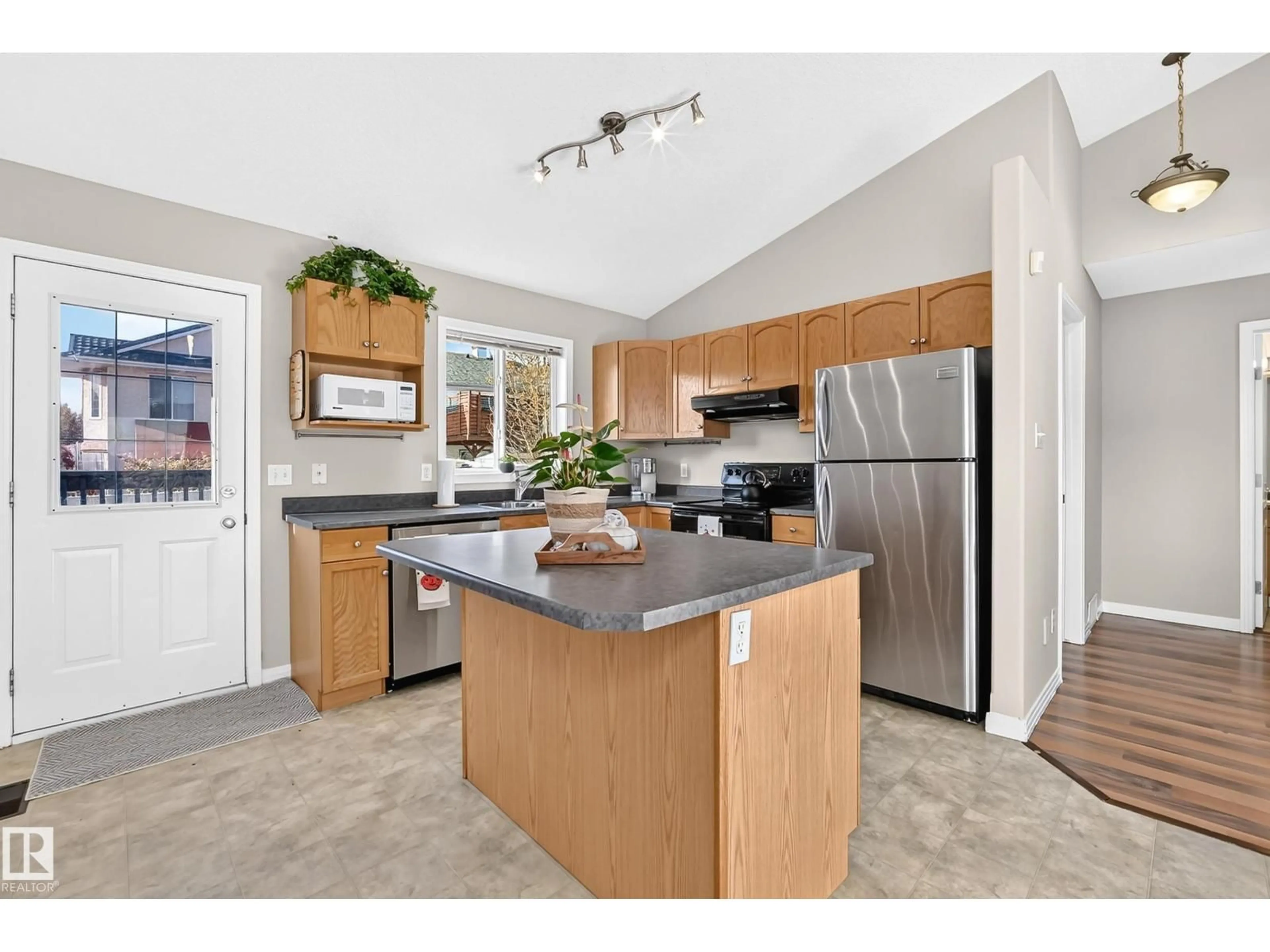 Open concept kitchen, unknown for NW - 15104 45 ST, Edmonton Alberta T5Y3B1