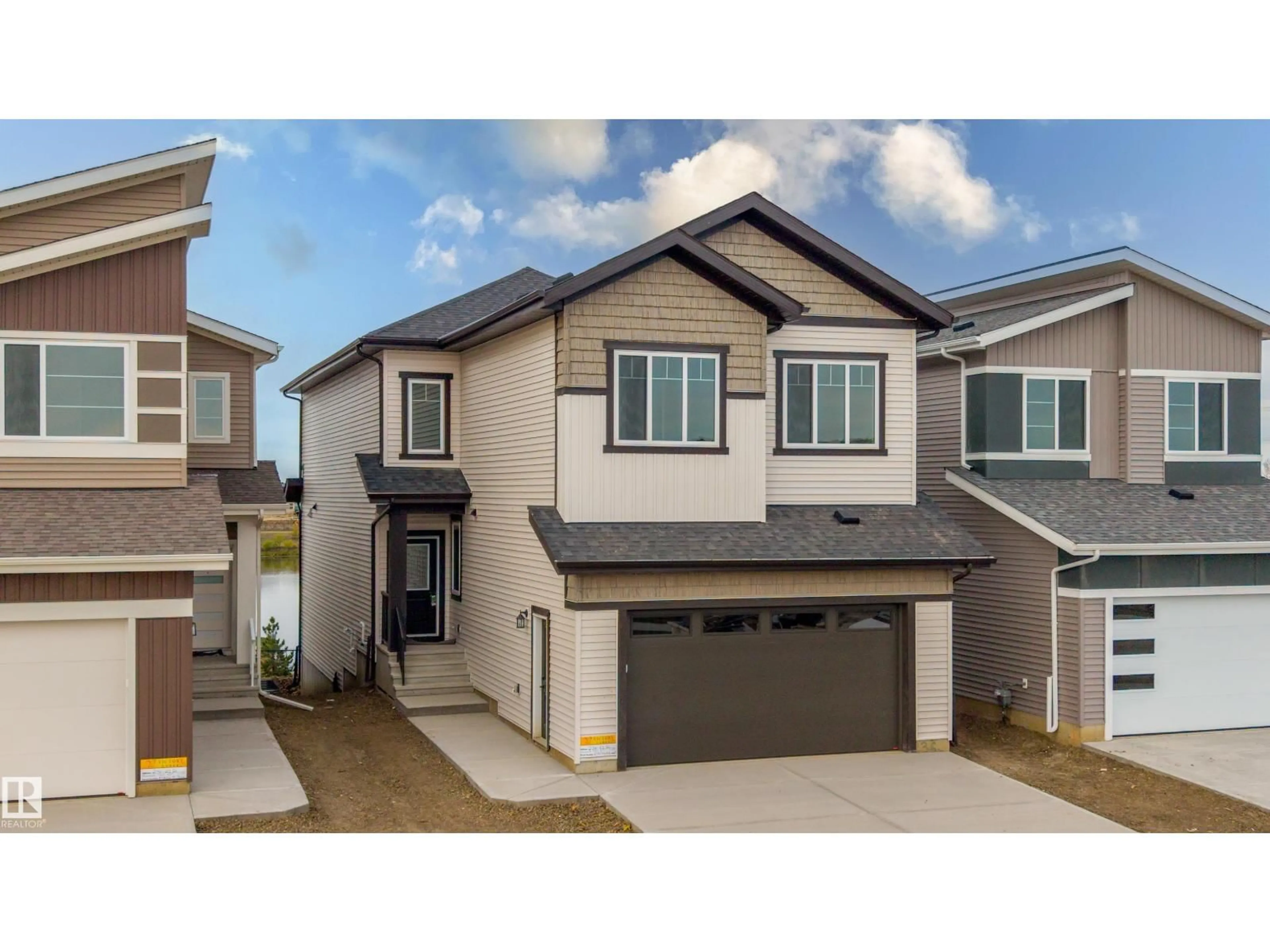 Home with vinyl exterior material, street for SW - 236 21 ST, Edmonton Alberta T6X3R3