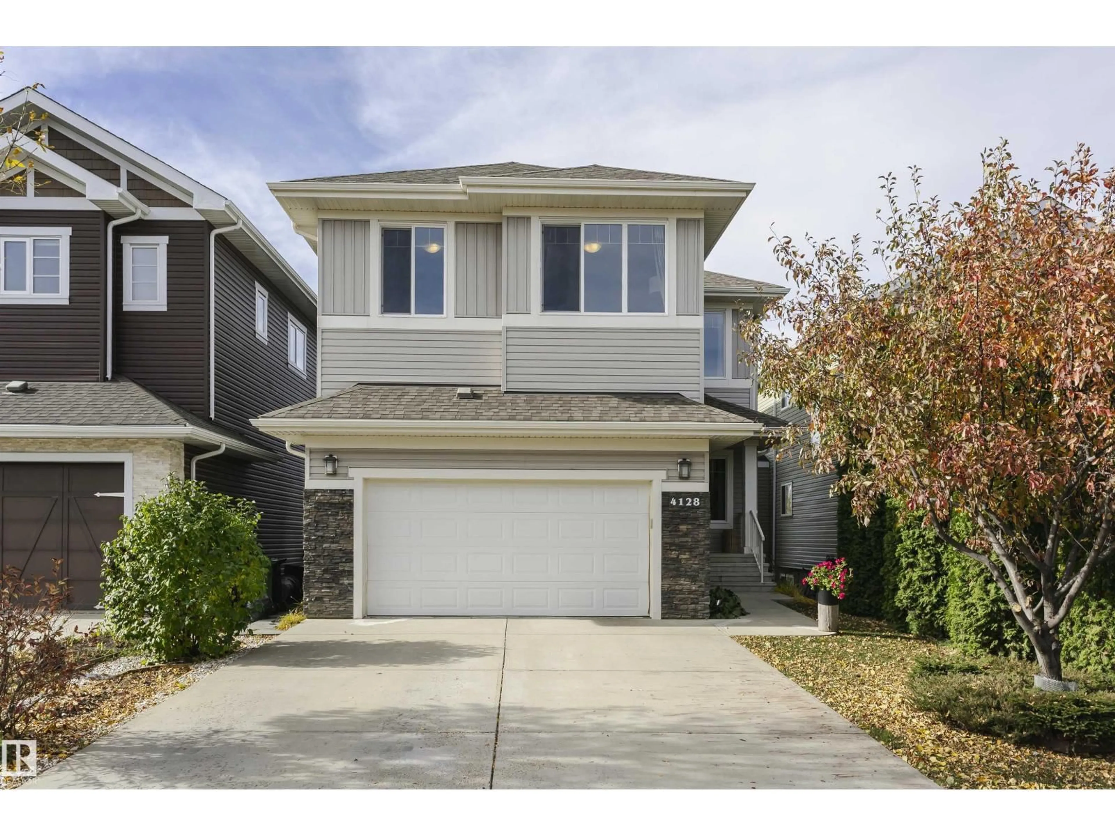 Home with vinyl exterior material, street for 4128 CHARLES LI SW, Edmonton Alberta T6W0Z5