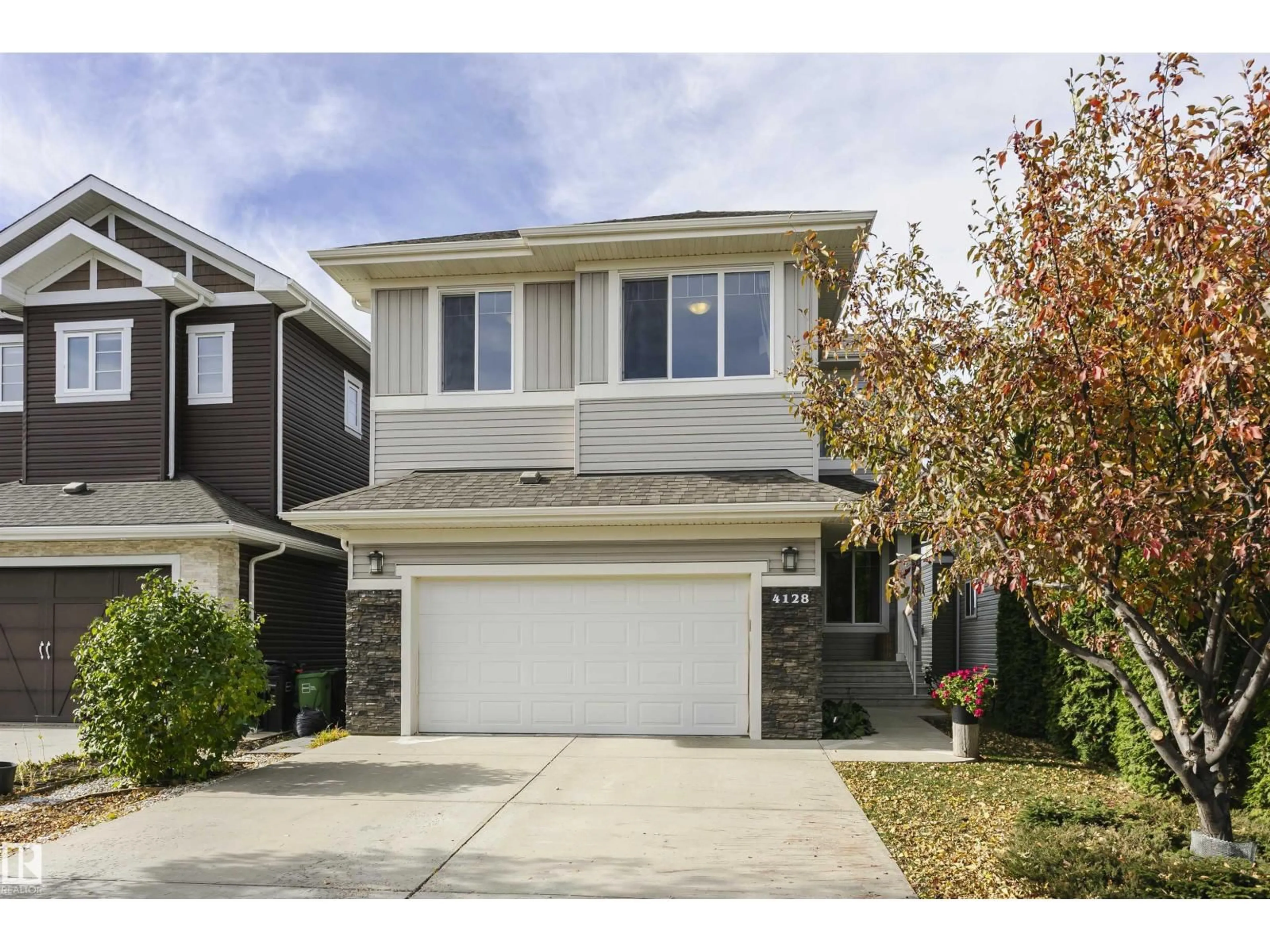 Home with vinyl exterior material, street for 4128 CHARLES LI SW, Edmonton Alberta T6W0Z5