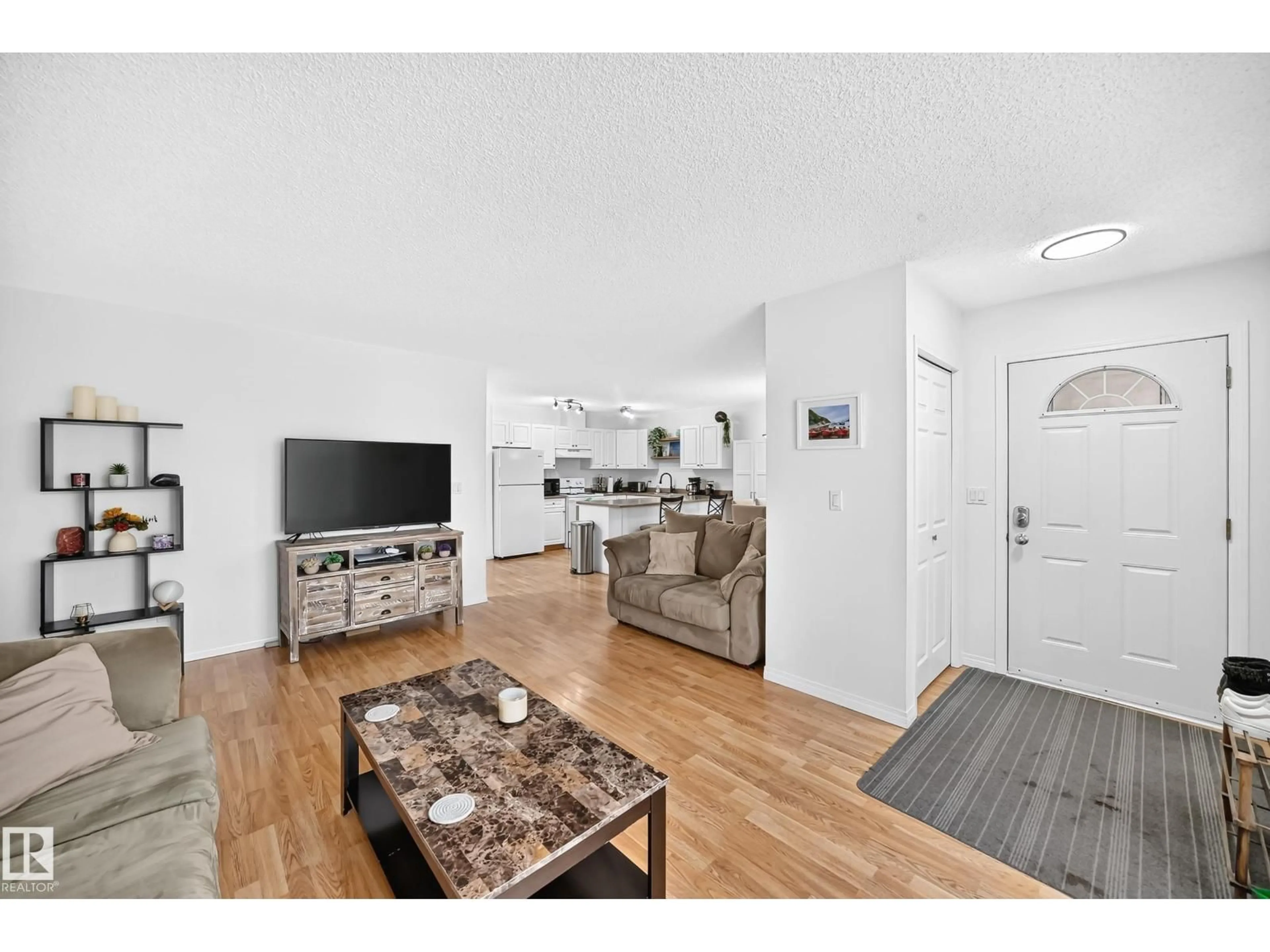 Living room with furniture, unknown for 10015B 97 AV, Fort Saskatchewan Alberta T8L1R3