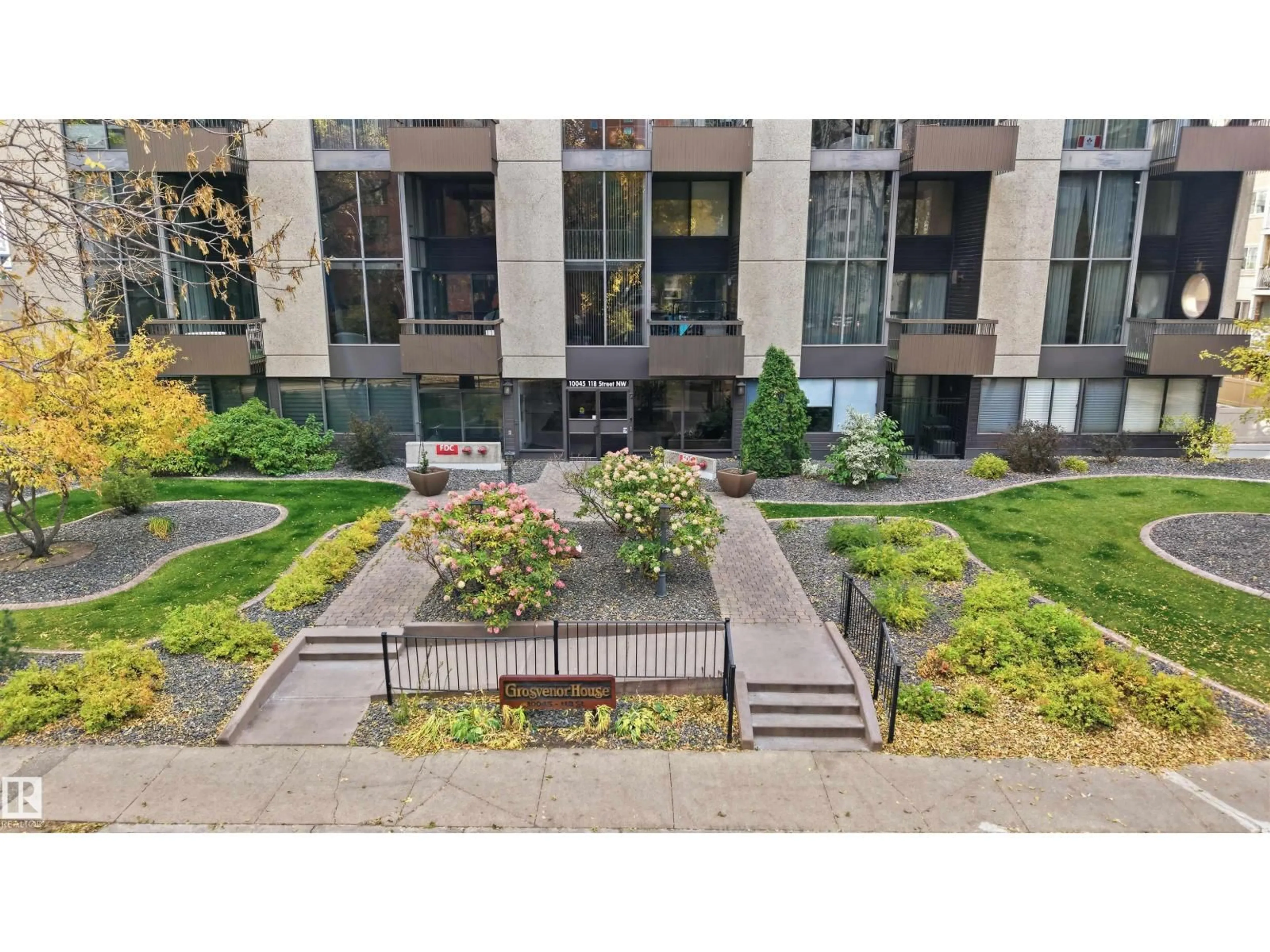 A pic from outside/outdoor area/front of a property/back of a property/a pic from drone, street for #407 - 10045 118 ST, Edmonton Alberta T5K2K2