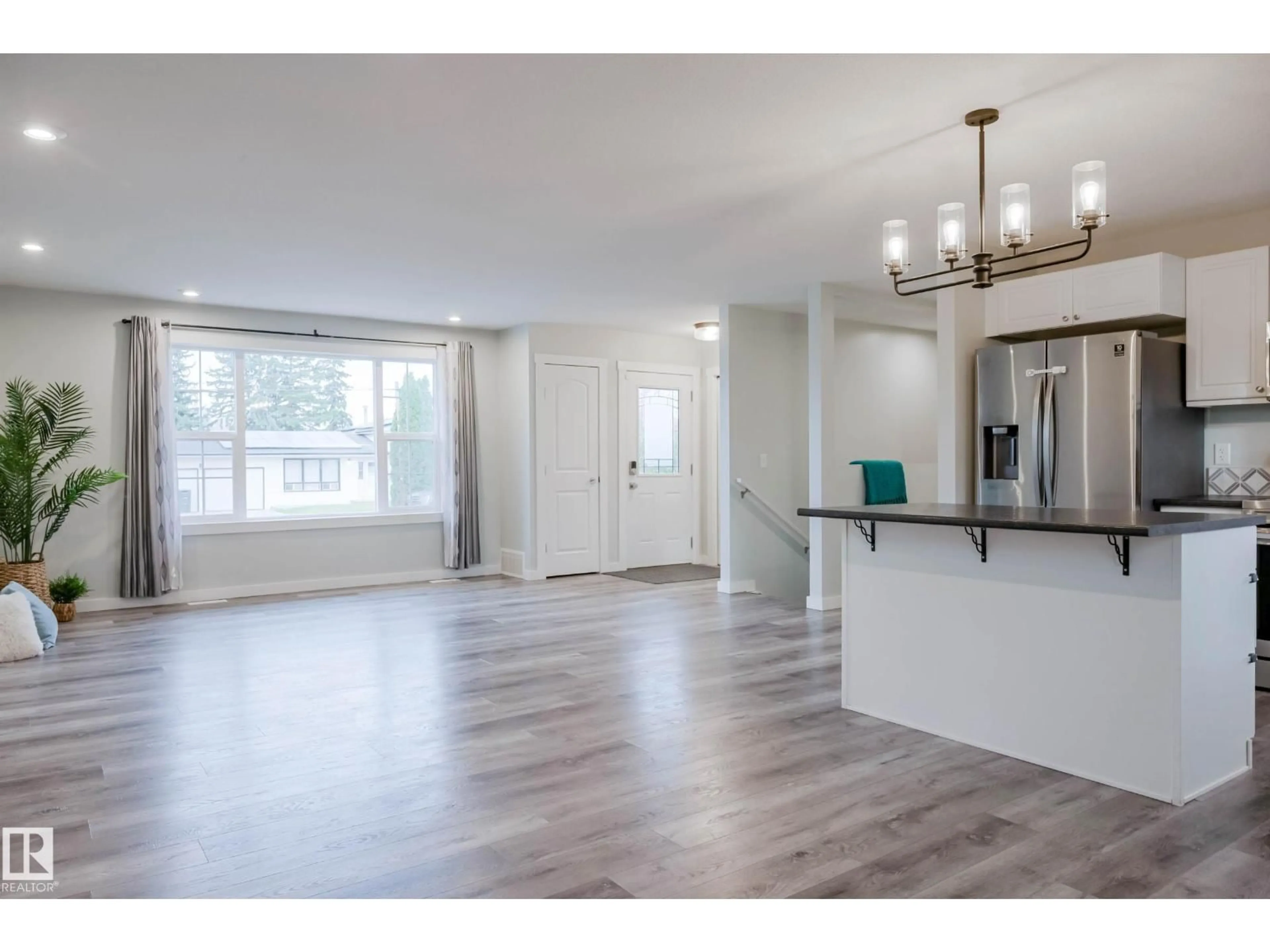 Open concept kitchen, wood/laminate floor for 5315 57A ST, Cold Lake Alberta T9M1R9