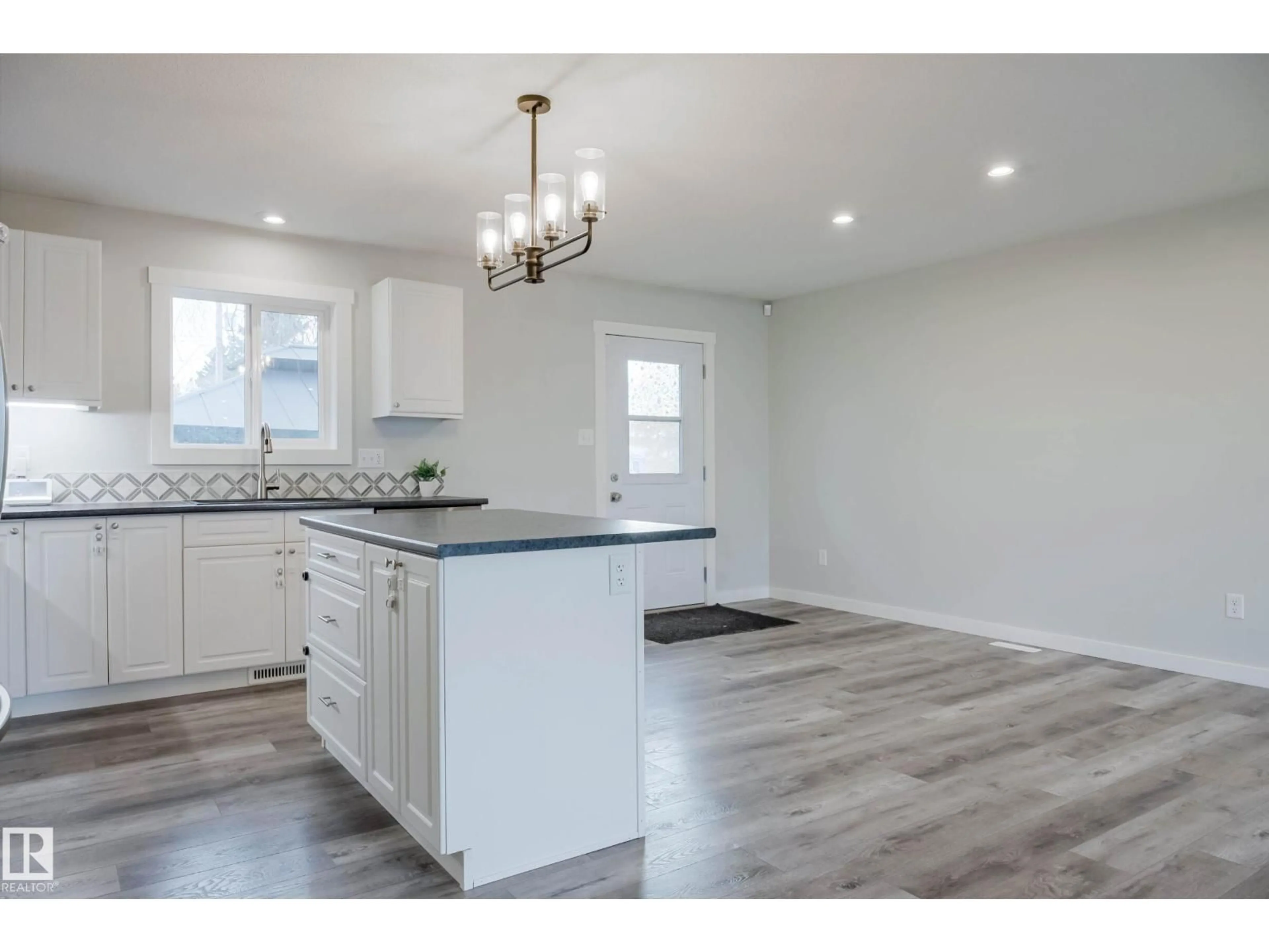Open concept kitchen, wood/laminate floor for 5315 57A ST, Cold Lake Alberta T9M1R9