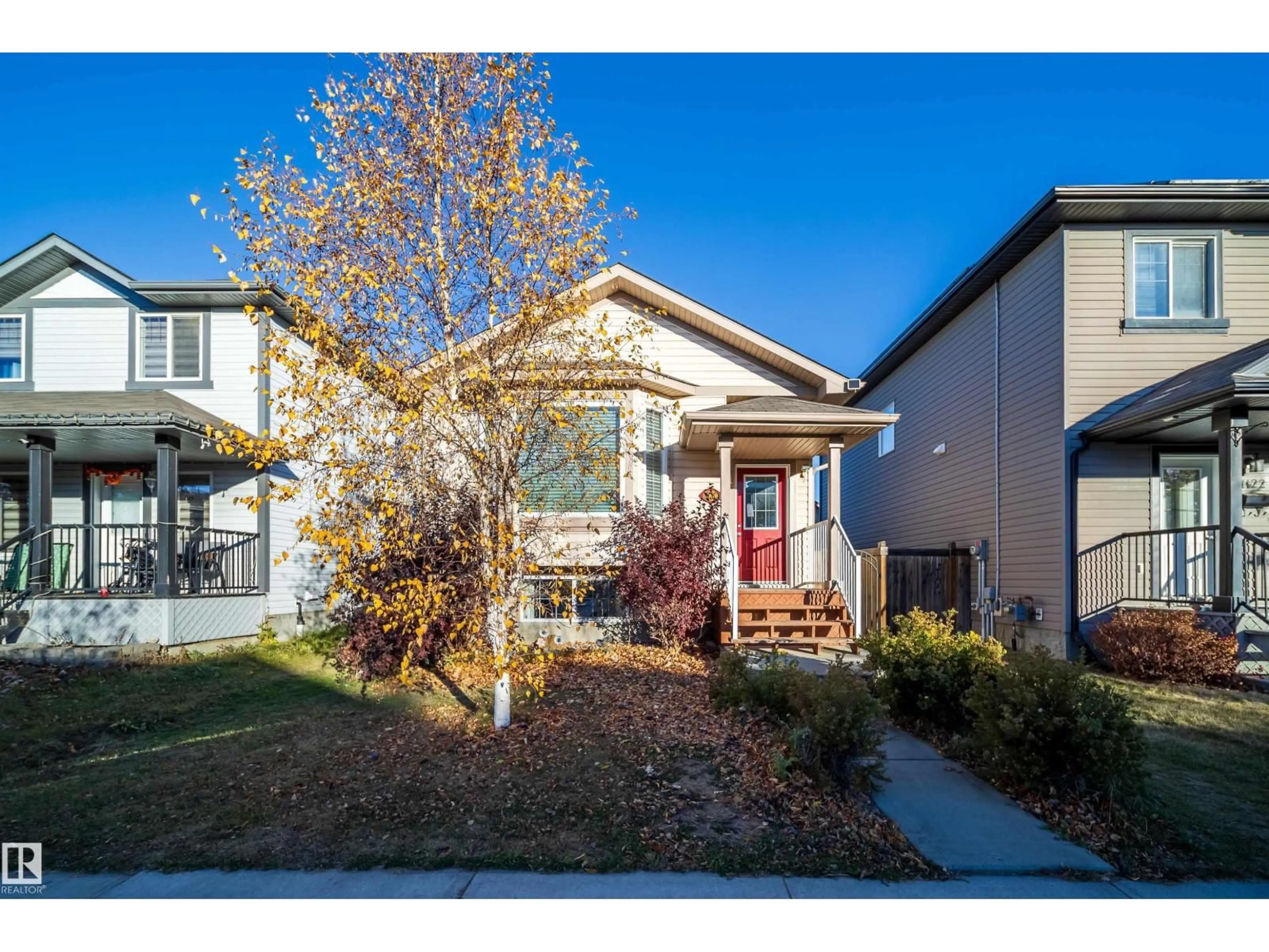 Home with vinyl exterior material, street for 1126 36A AV, Edmonton Alberta T6T0G1