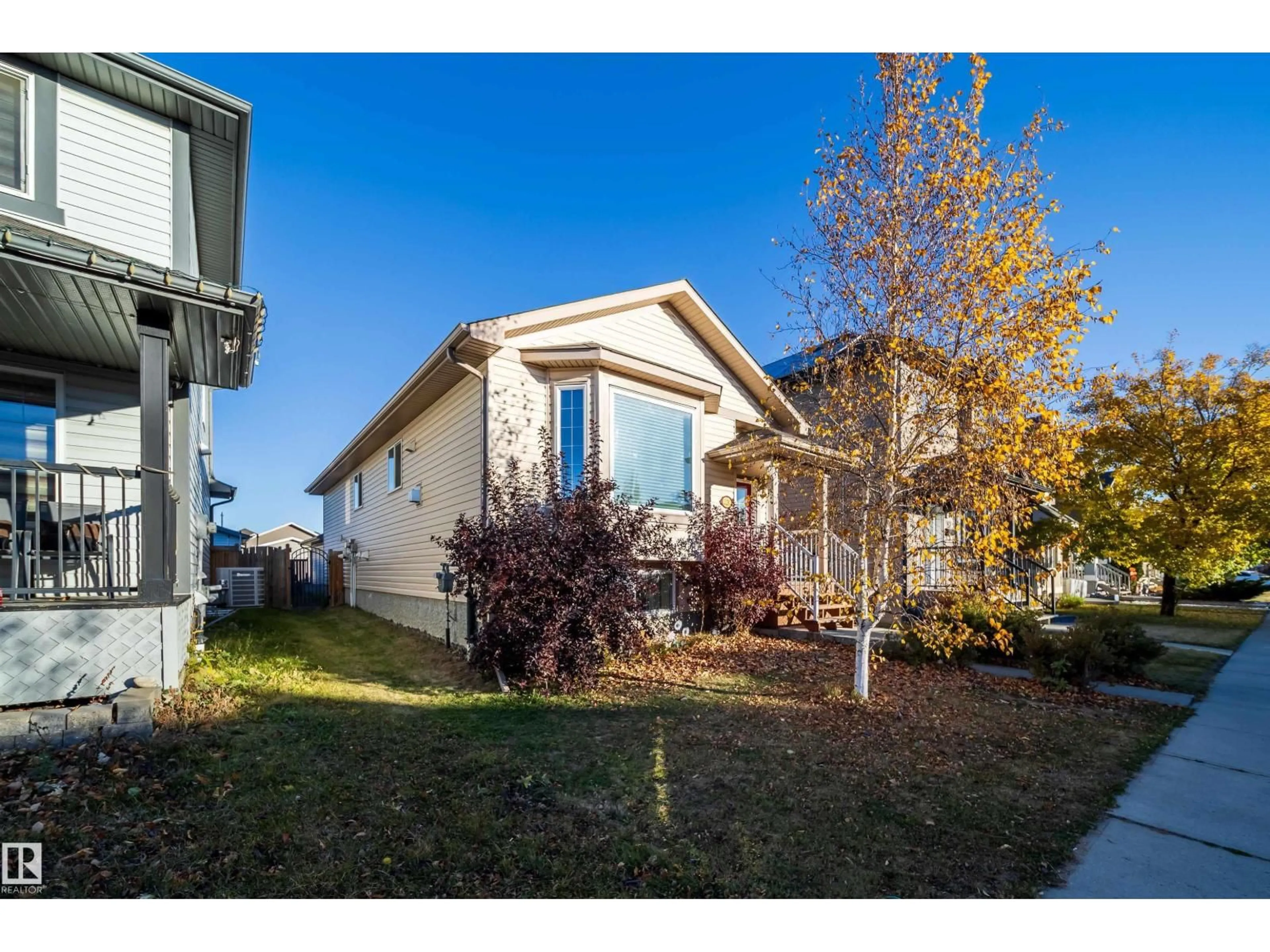 Home with vinyl exterior material, street for 1126 36A AV, Edmonton Alberta T6T0G1