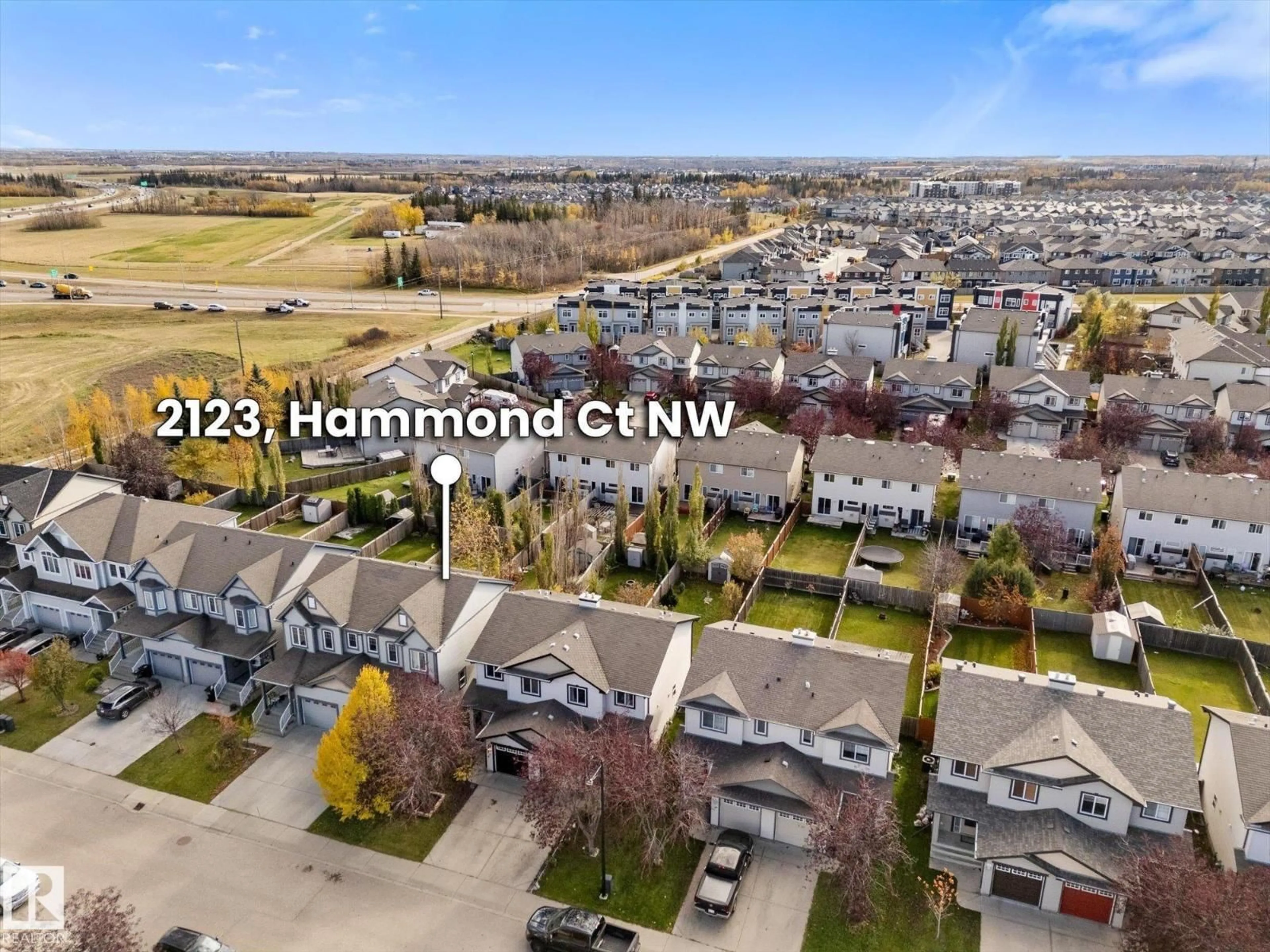 A pic from outside/outdoor area/front of a property/back of a property/a pic from drone, unknown for 2123 HAMMOND CO, Edmonton Alberta T6M0J1