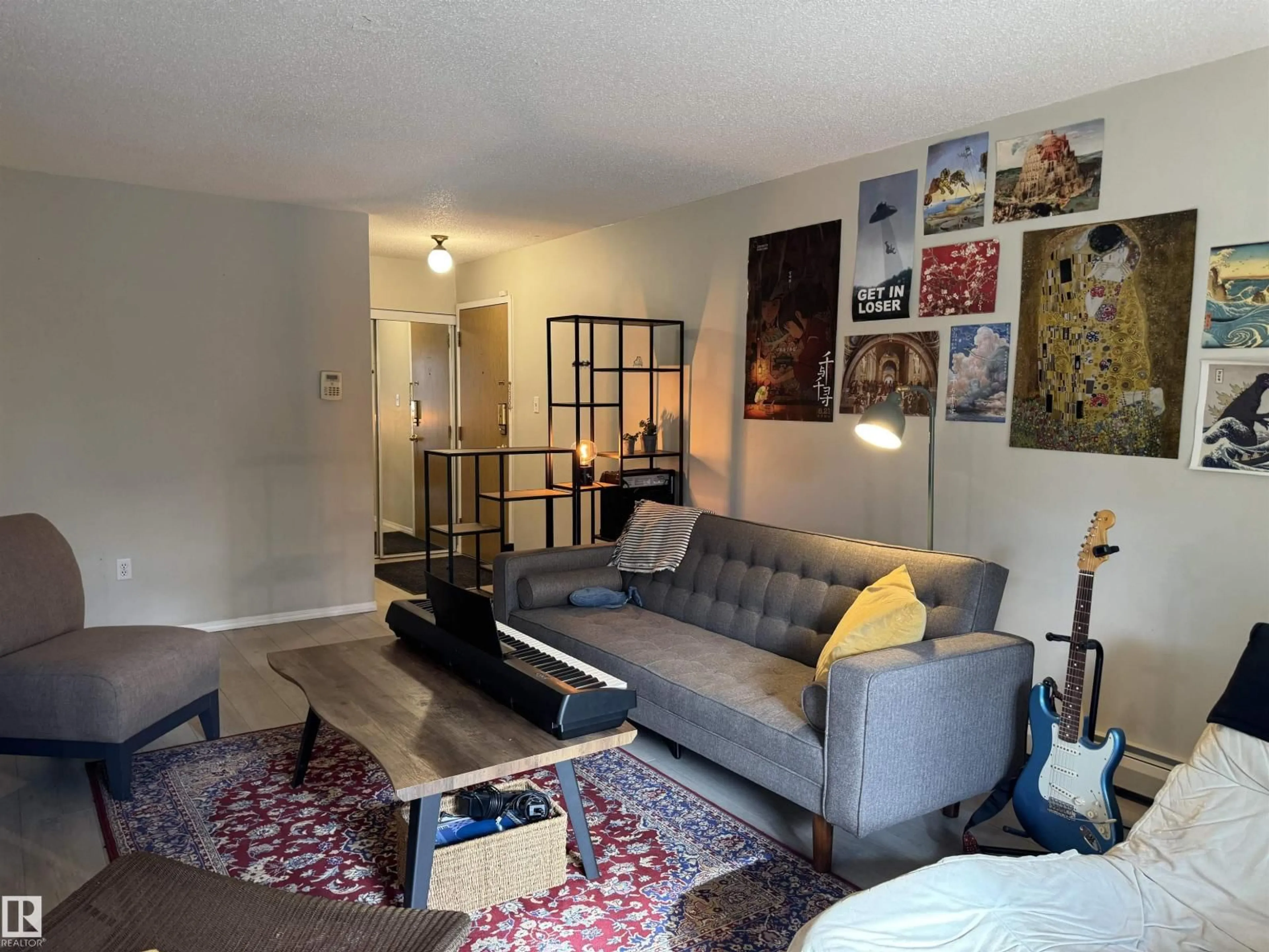 Living room with furniture, unknown for 201 - 10732 86 AV, Edmonton Alberta T6E2M9