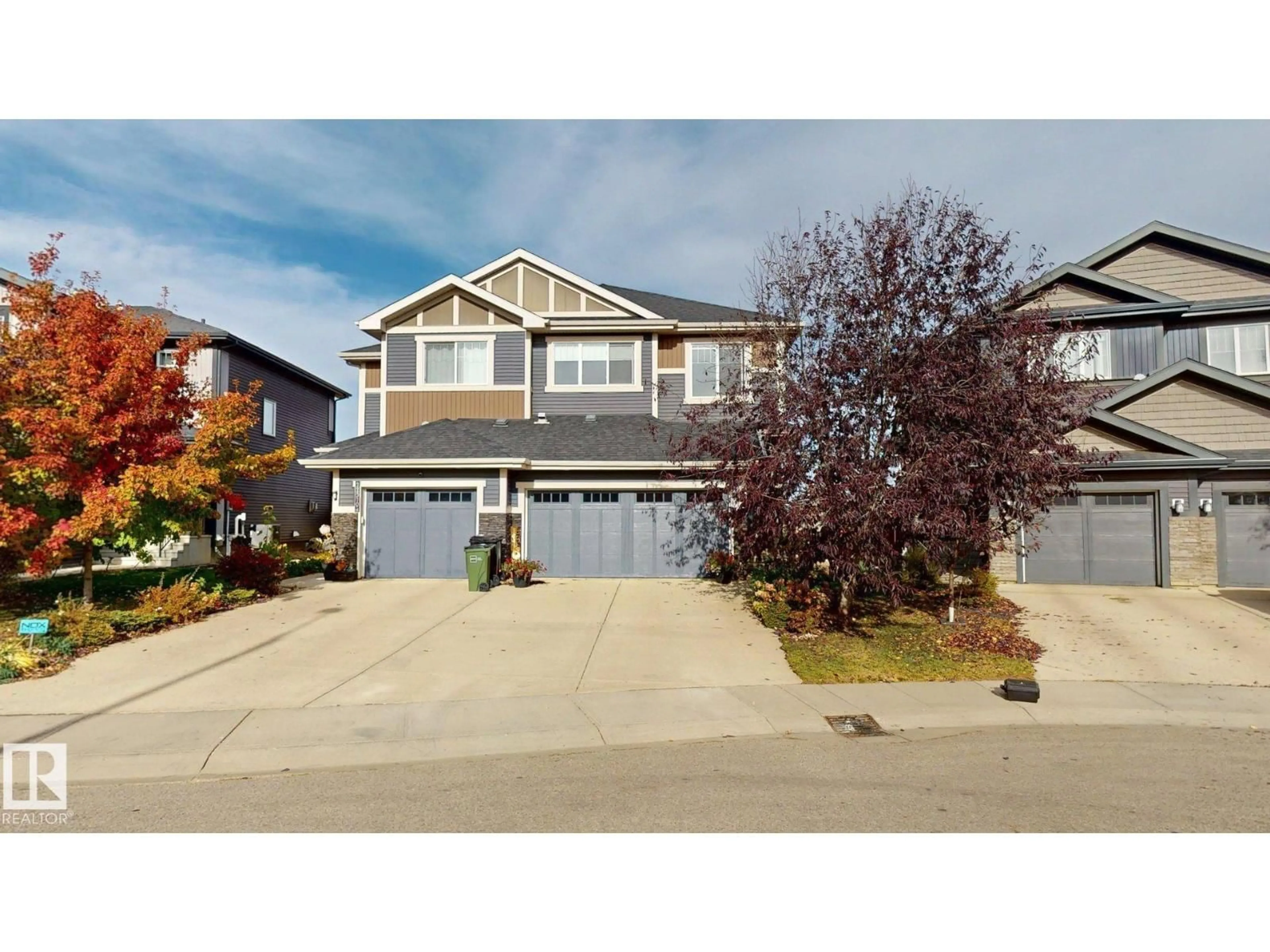 Home with vinyl exterior material, street for NW - 22308 82 AV, Edmonton Alberta T5T7A3