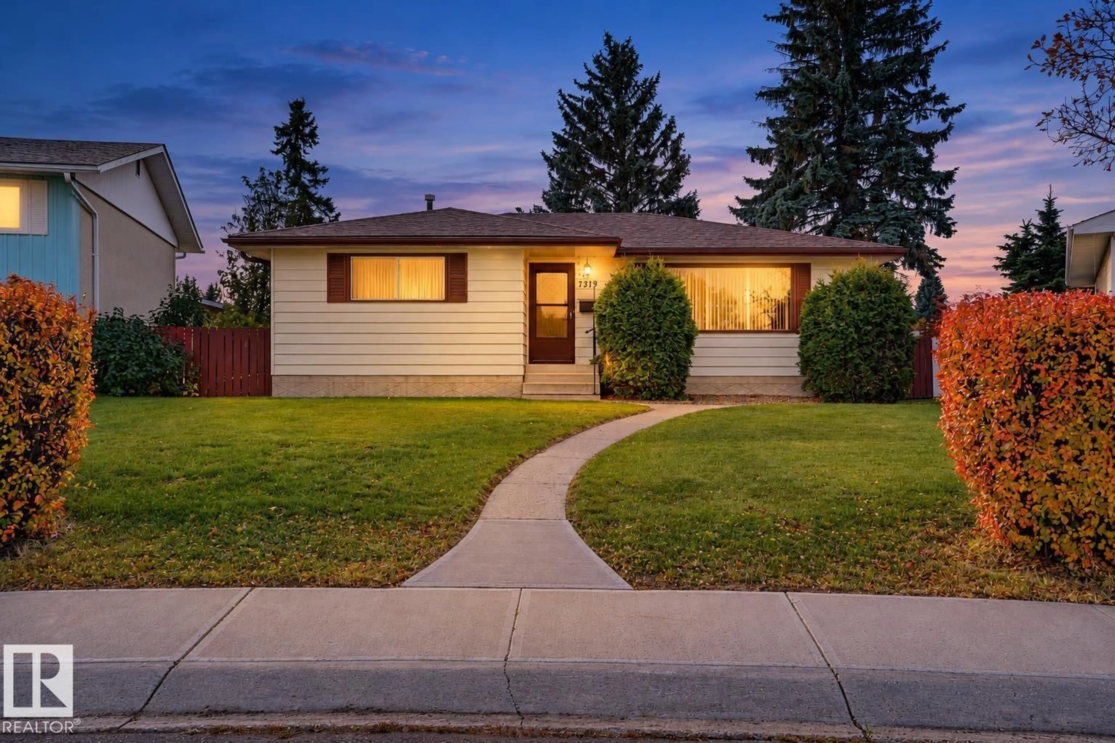 Home with vinyl exterior material, street for 7319 150 AV, Edmonton Alberta T5C2X9