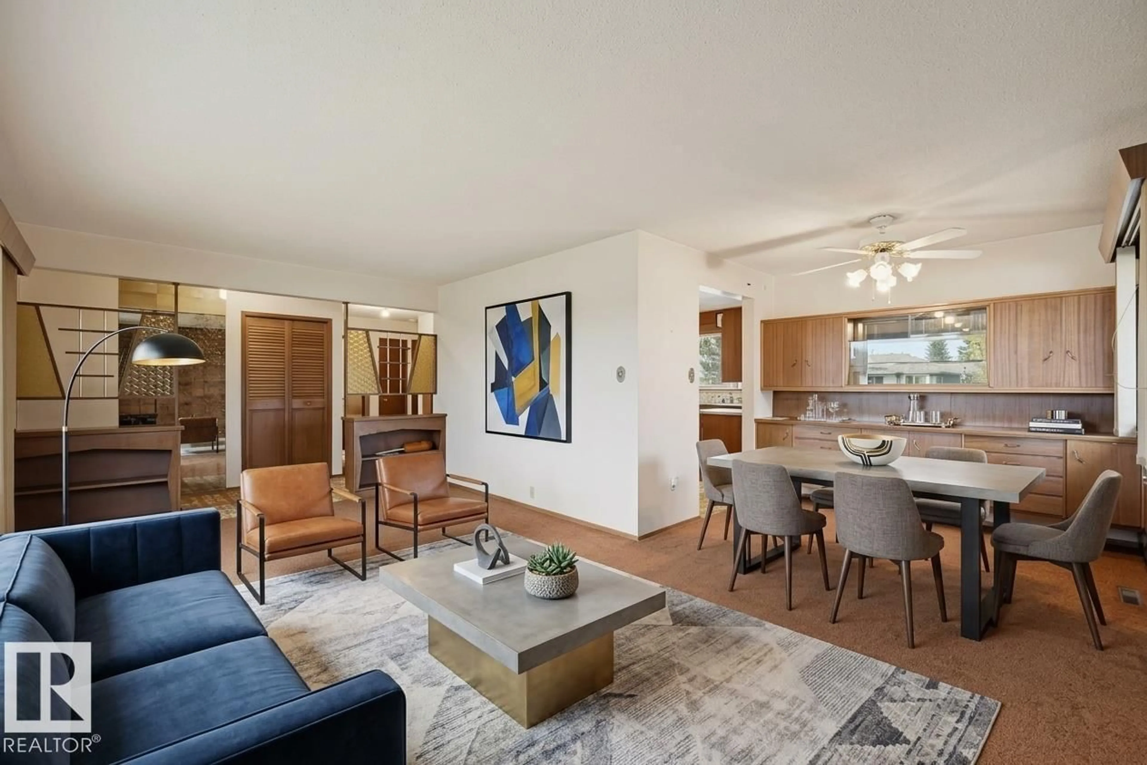 Living room with furniture, wood/laminate floor for 7319 150 AV, Edmonton Alberta T5C2X9