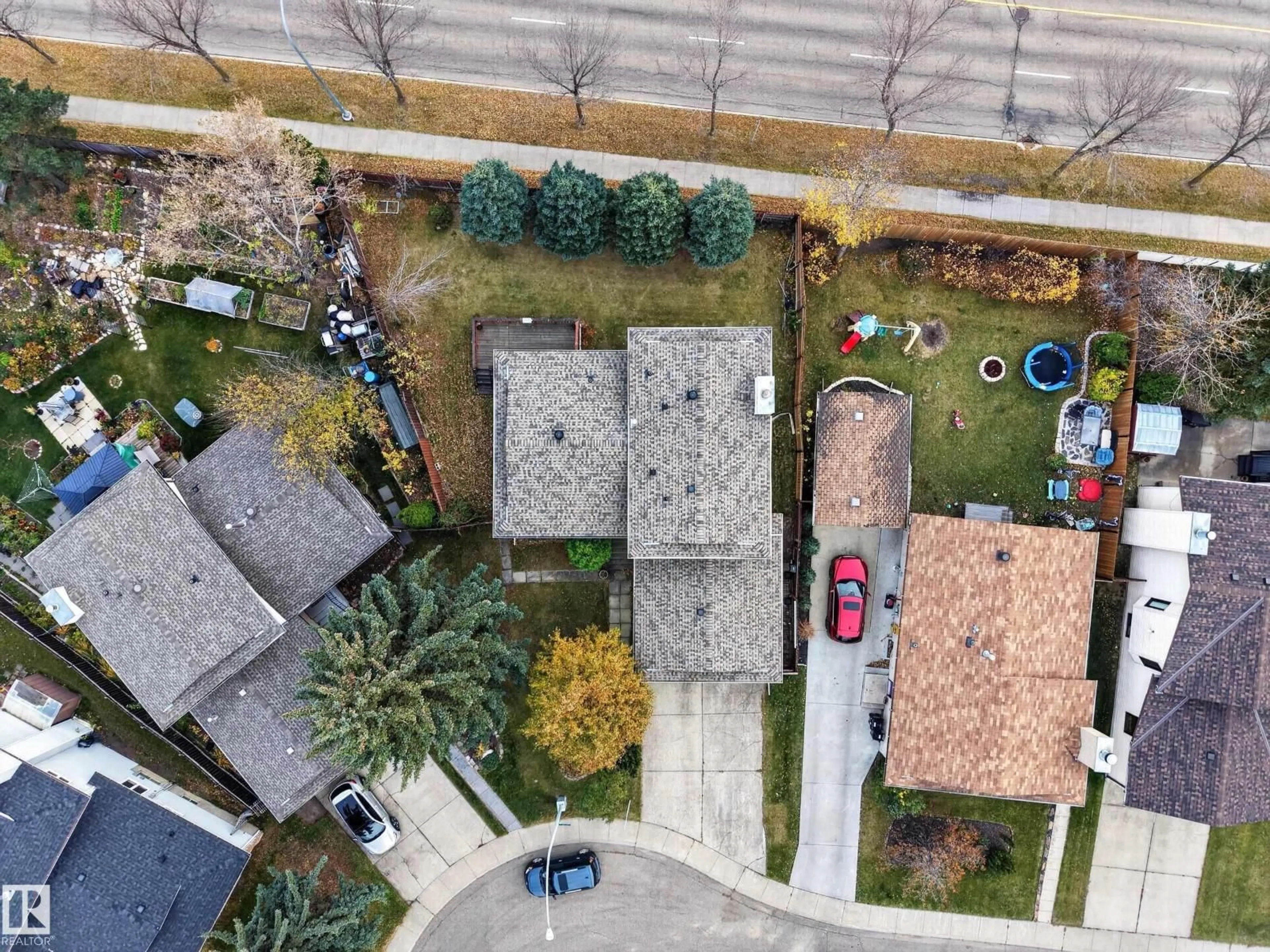 A pic from outside/outdoor area/front of a property/back of a property/a pic from drone, street for NW - 3135 145 AV, Edmonton Alberta T5Y2E9
