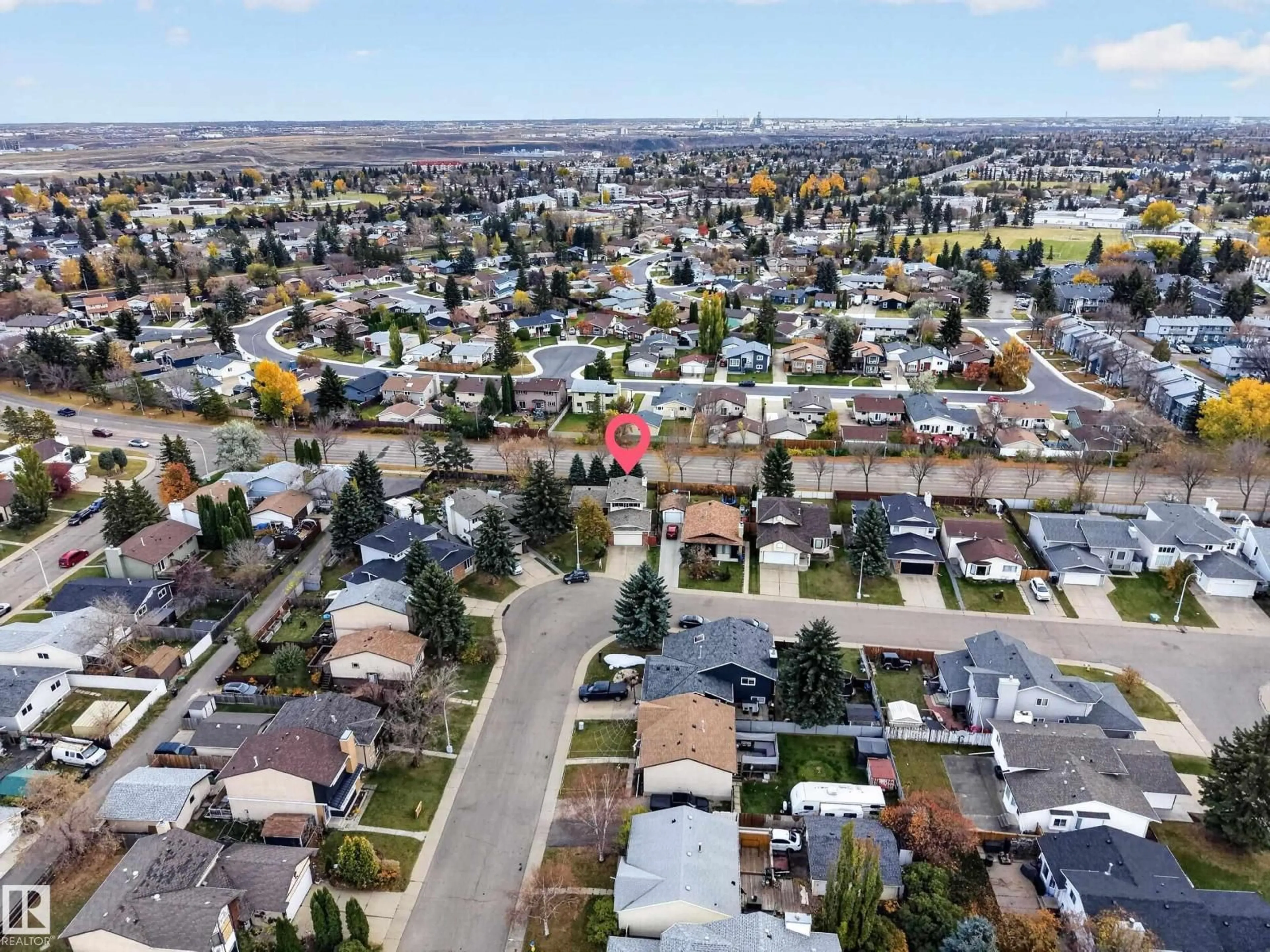 A pic from outside/outdoor area/front of a property/back of a property/a pic from drone, street for NW - 3135 145 AV, Edmonton Alberta T5Y2E9