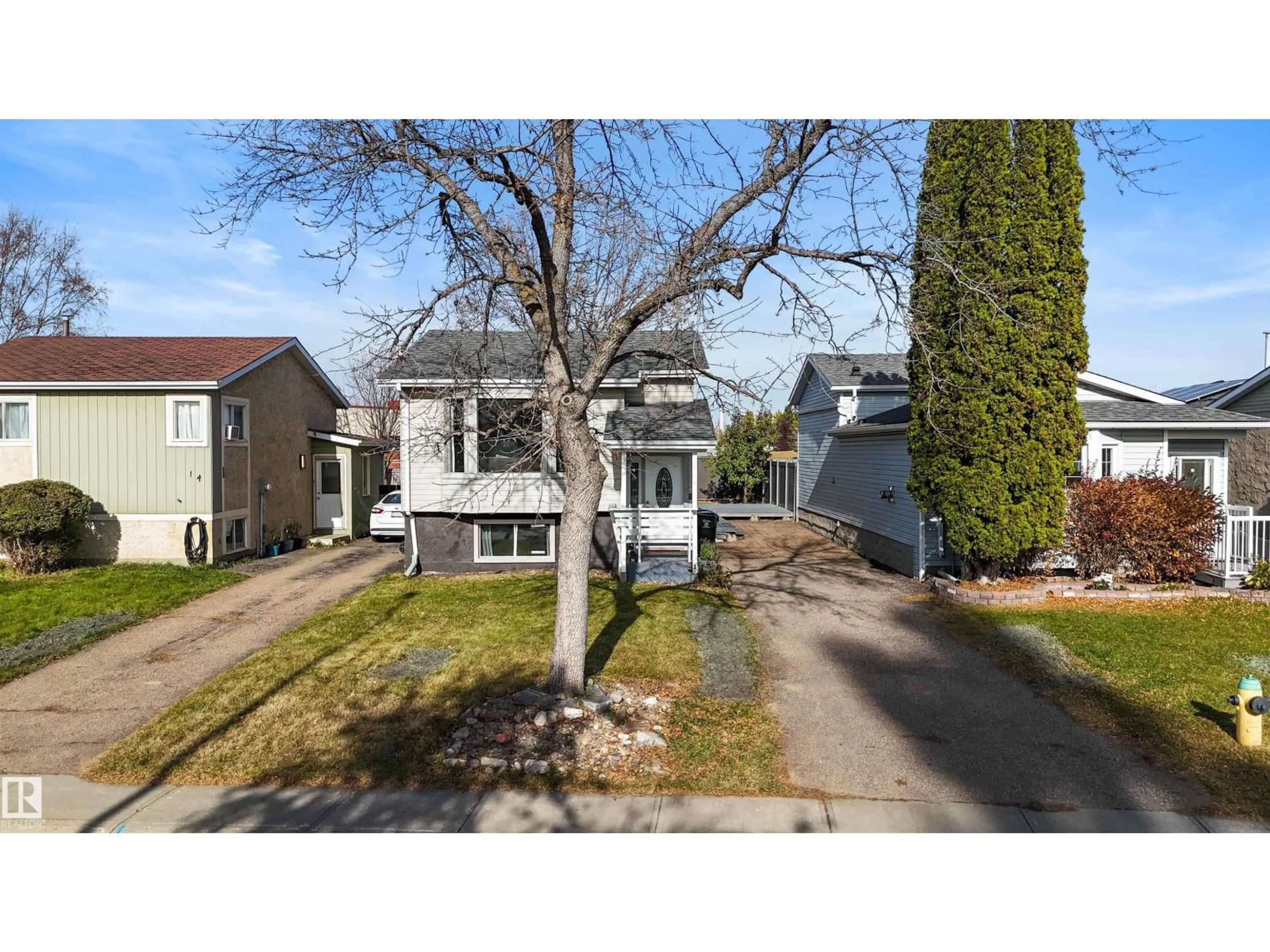 A pic from outside/outdoor area/front of a property/back of a property/a pic from drone, street for 16 WILSON DR, Devon Alberta T9G1V6