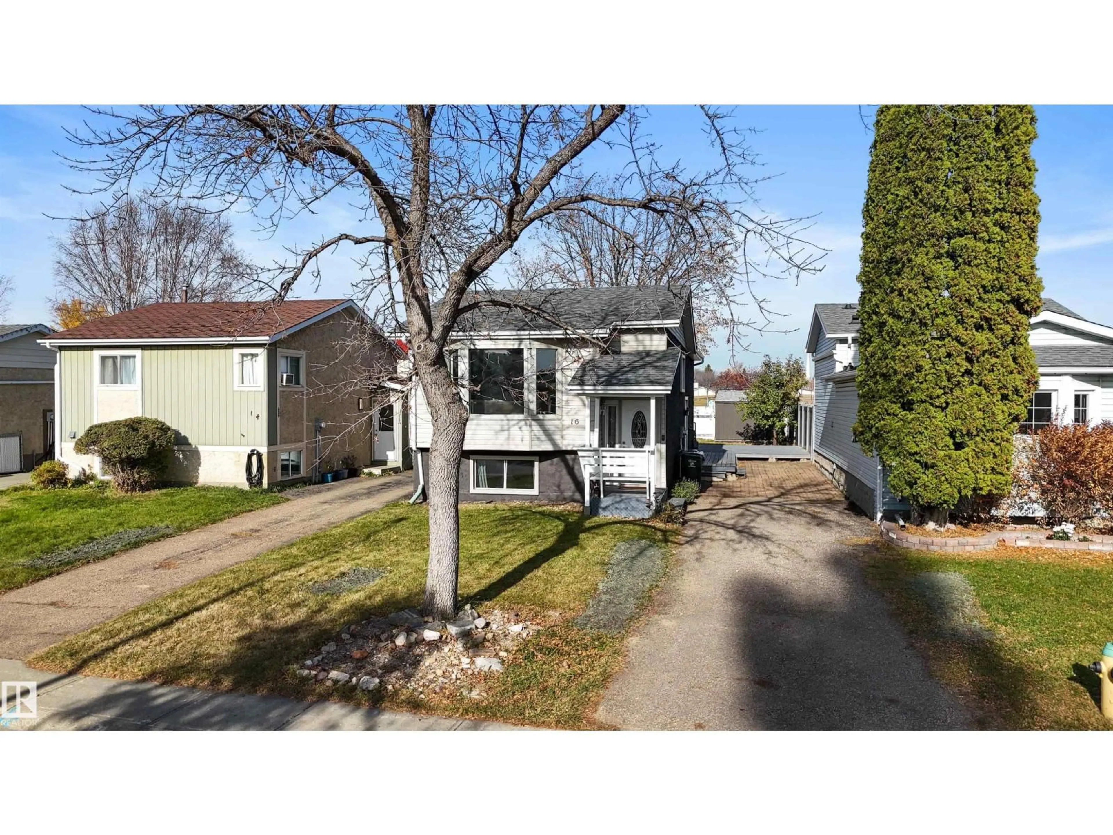 A pic from outside/outdoor area/front of a property/back of a property/a pic from drone, street for 16 WILSON DR, Devon Alberta T9G1V6