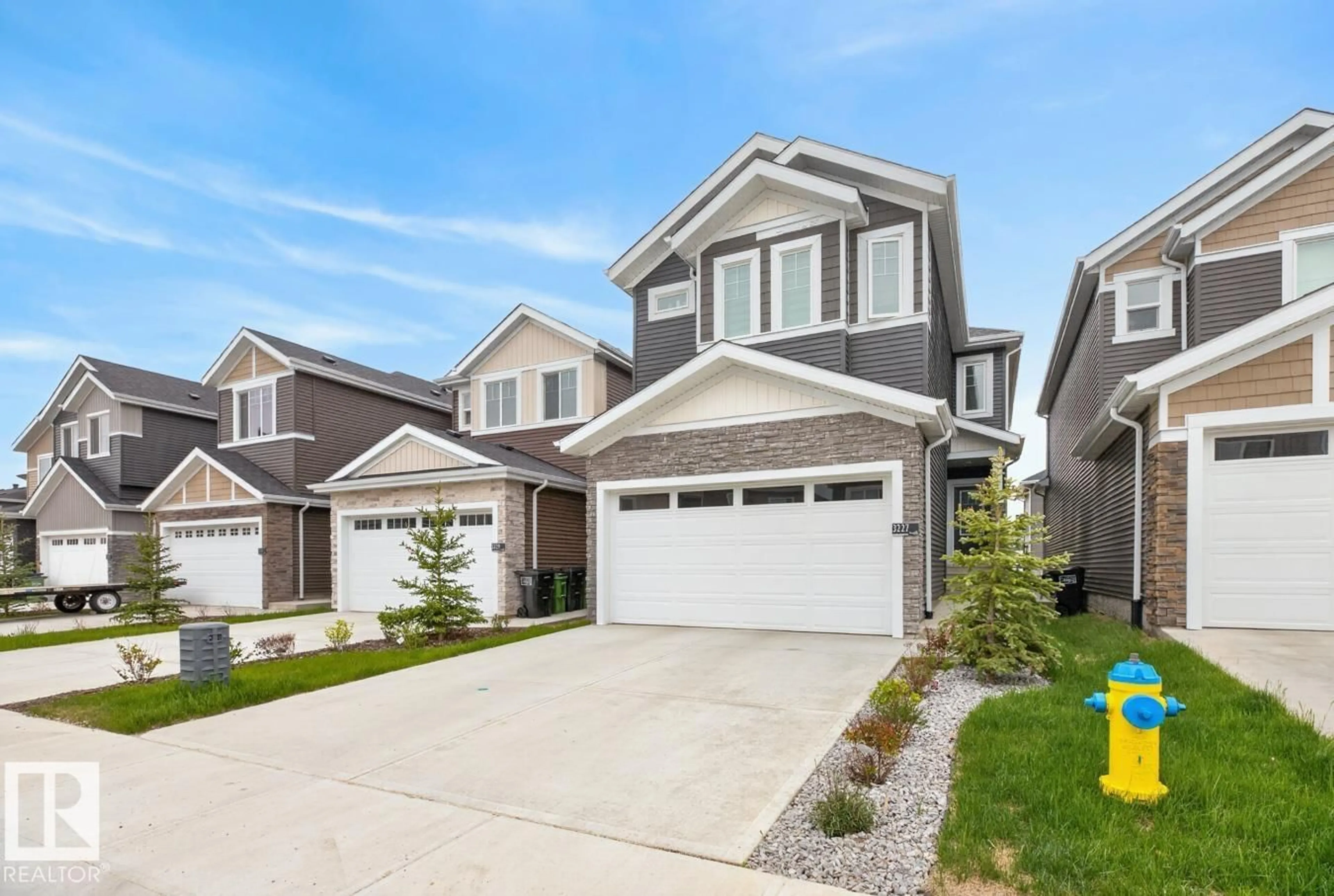Home with vinyl exterior material, street for NW - 3227 MAGPIE LI, Edmonton Alberta T5S0V4