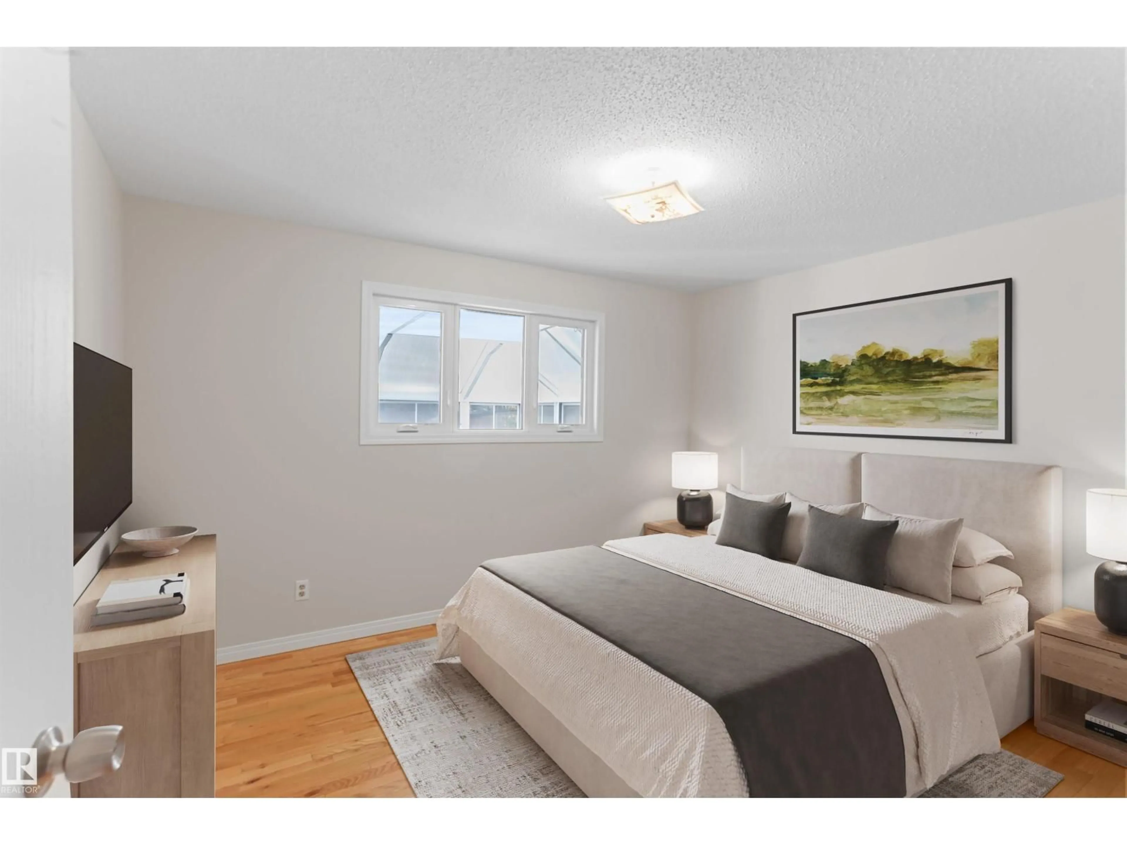 Bedroom with bed, wood/laminate floor for 48 PIPESTONE DR, Devon Alberta T9G1T3