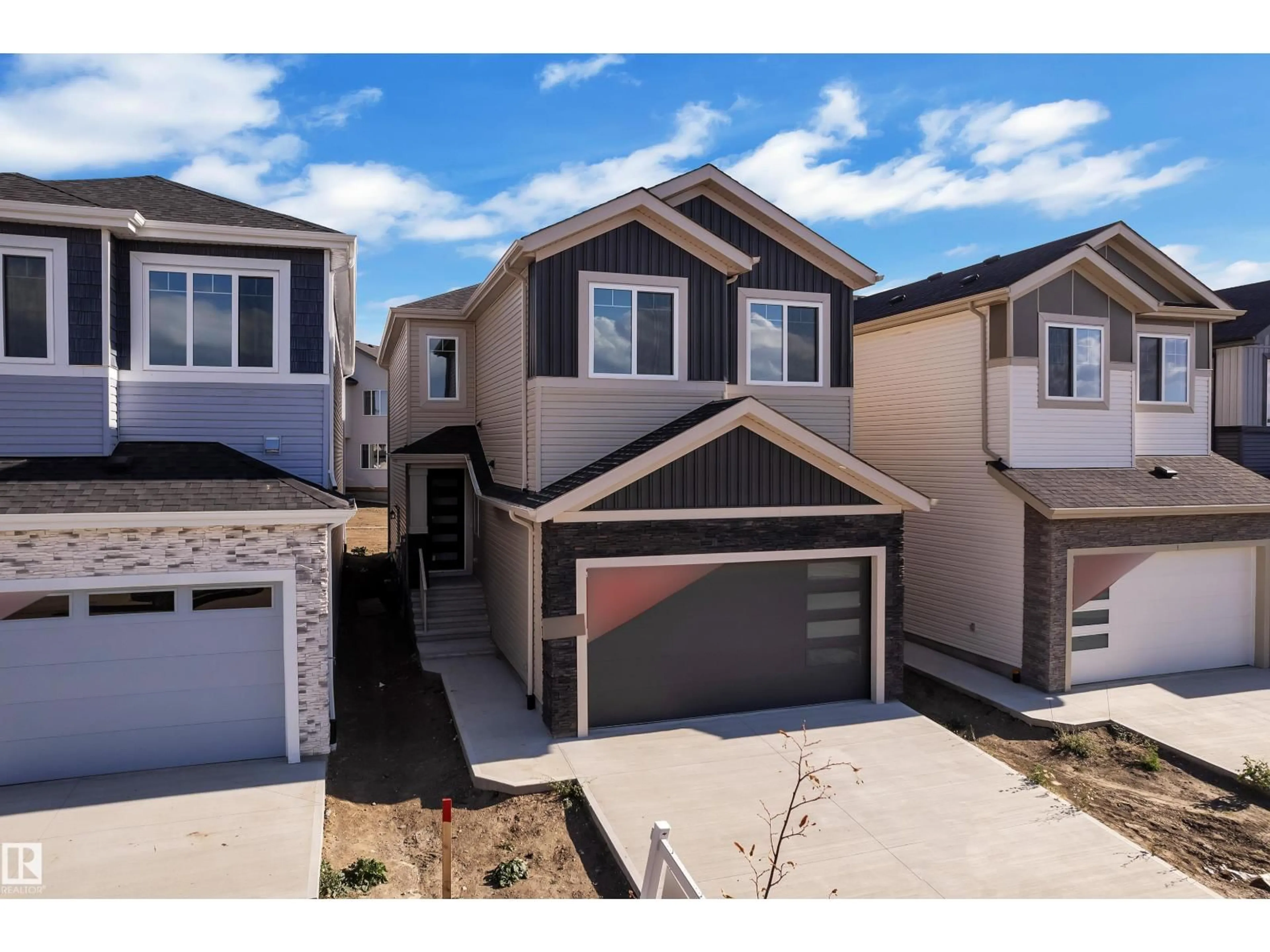Home with vinyl exterior material, street for 4311 36 ST, Beaumont Alberta T4X3G8