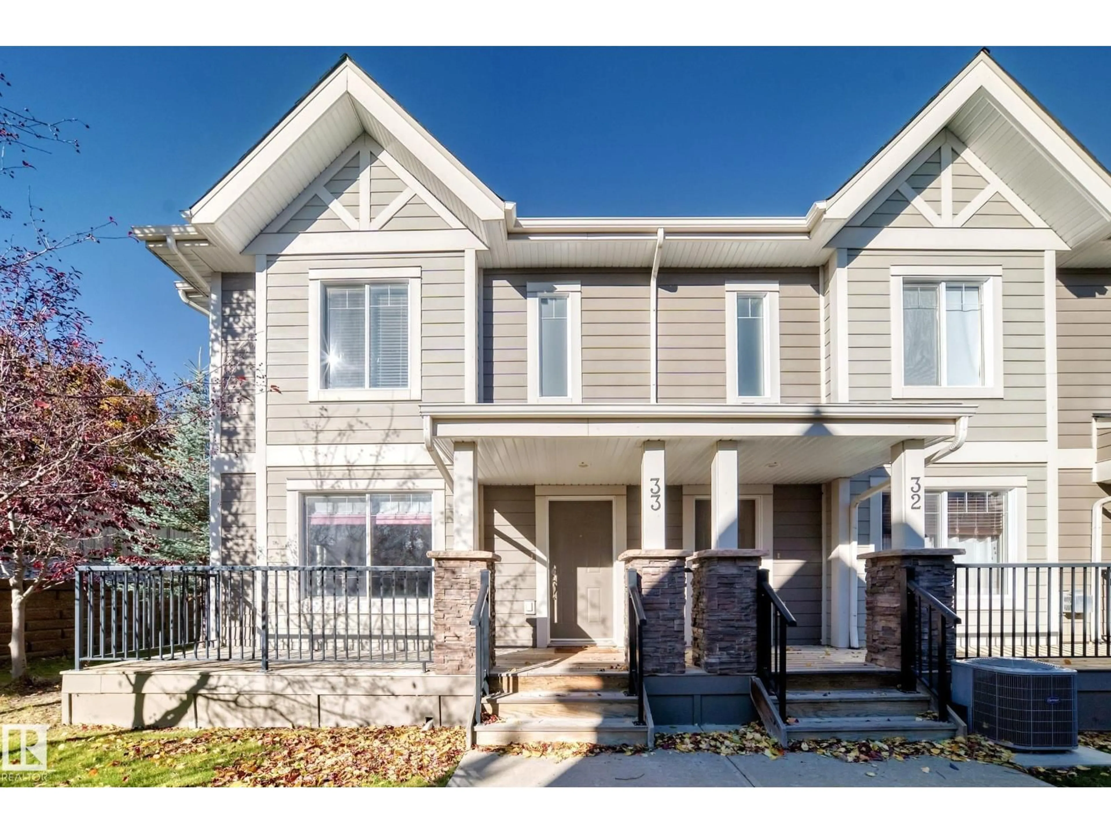 Home with vinyl exterior material, street for #33 - 1150 WINDERMERE WY, Edmonton Alberta T6W2B6