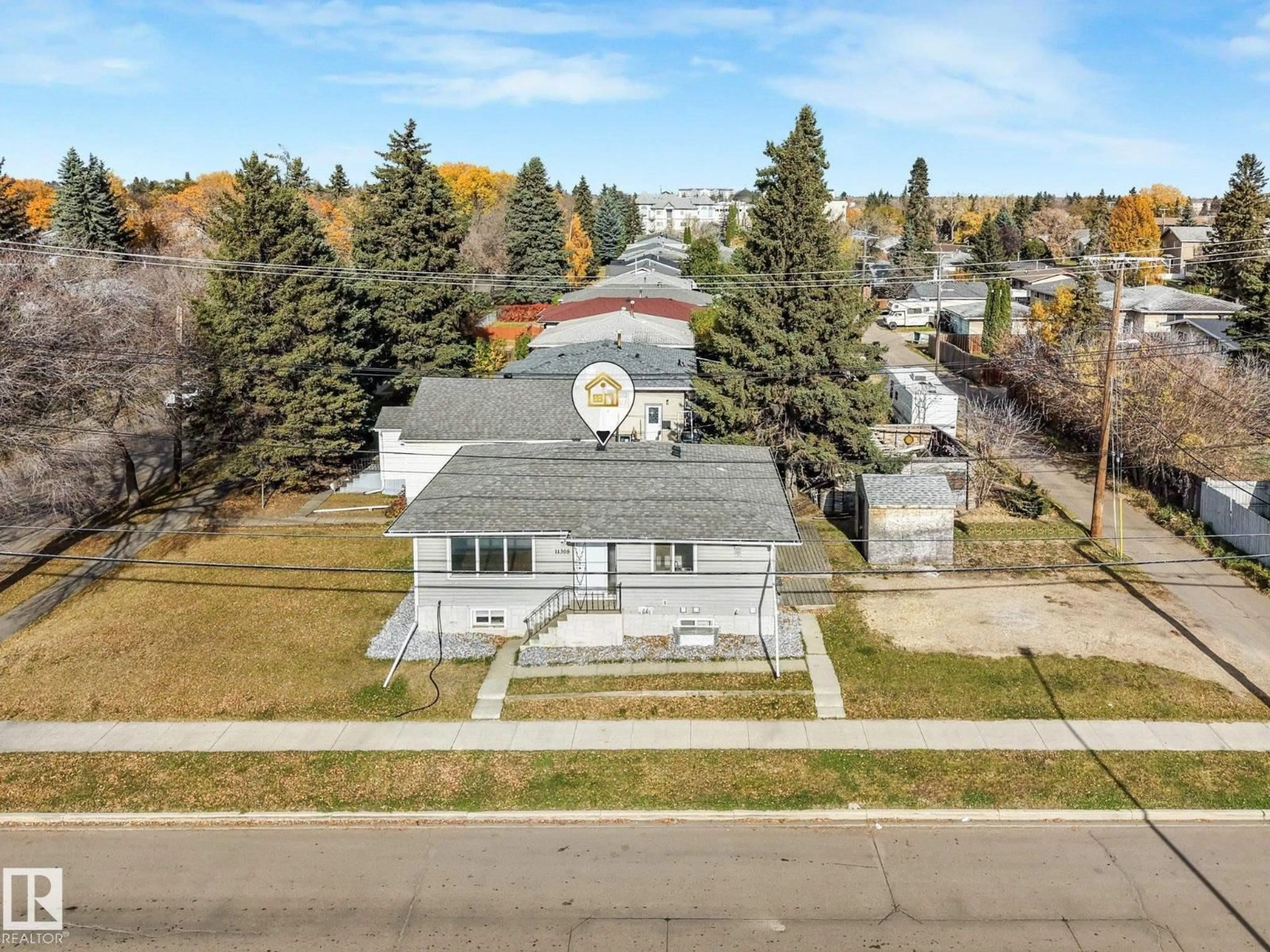 A pic from outside/outdoor area/front of a property/back of a property/a pic from drone, street for 11308 129 AV, Edmonton Alberta T5E0L8