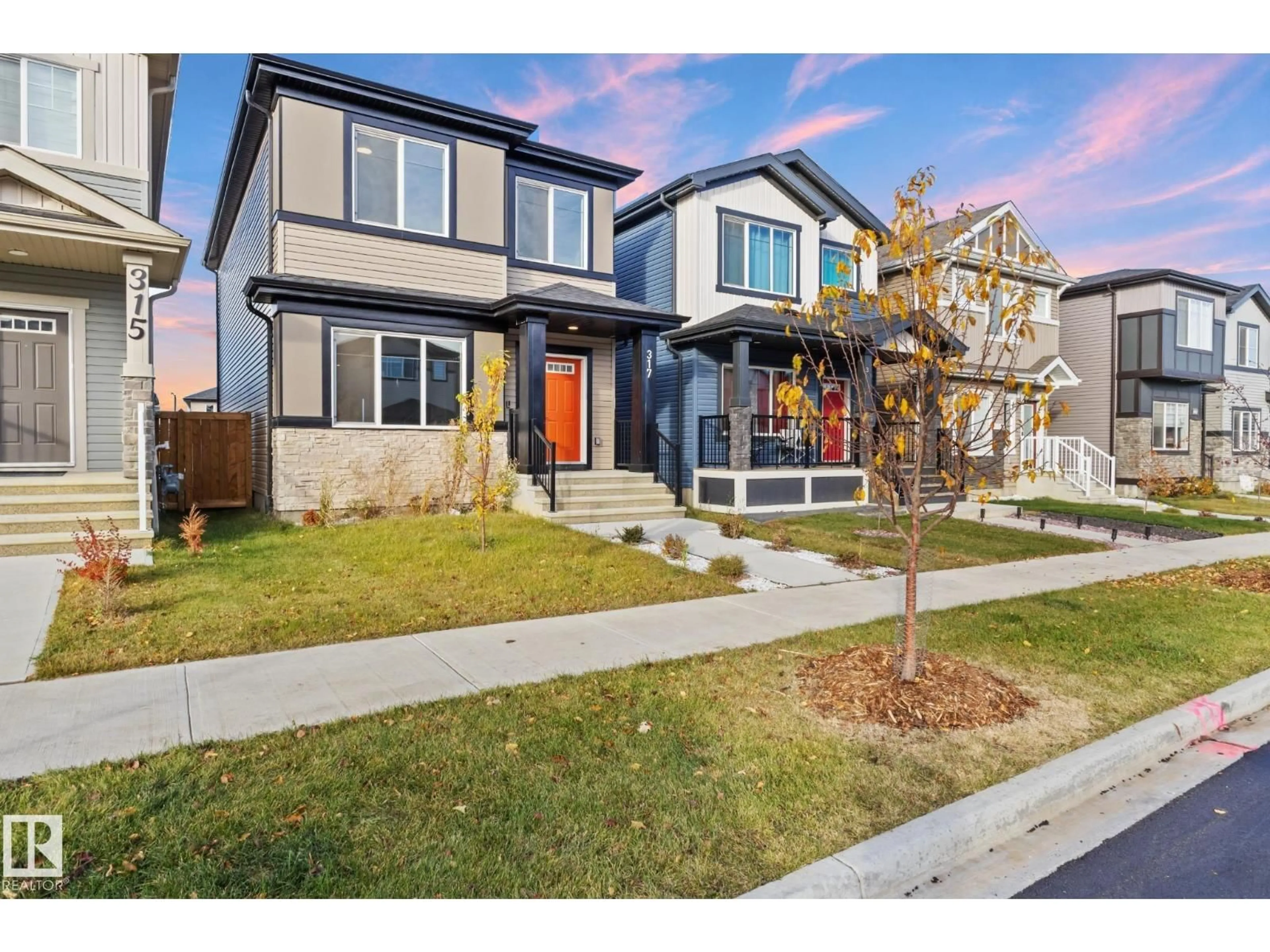 Home with brick exterior material, street for 317 JUNIPER CV, Leduc Alberta T9E1S6