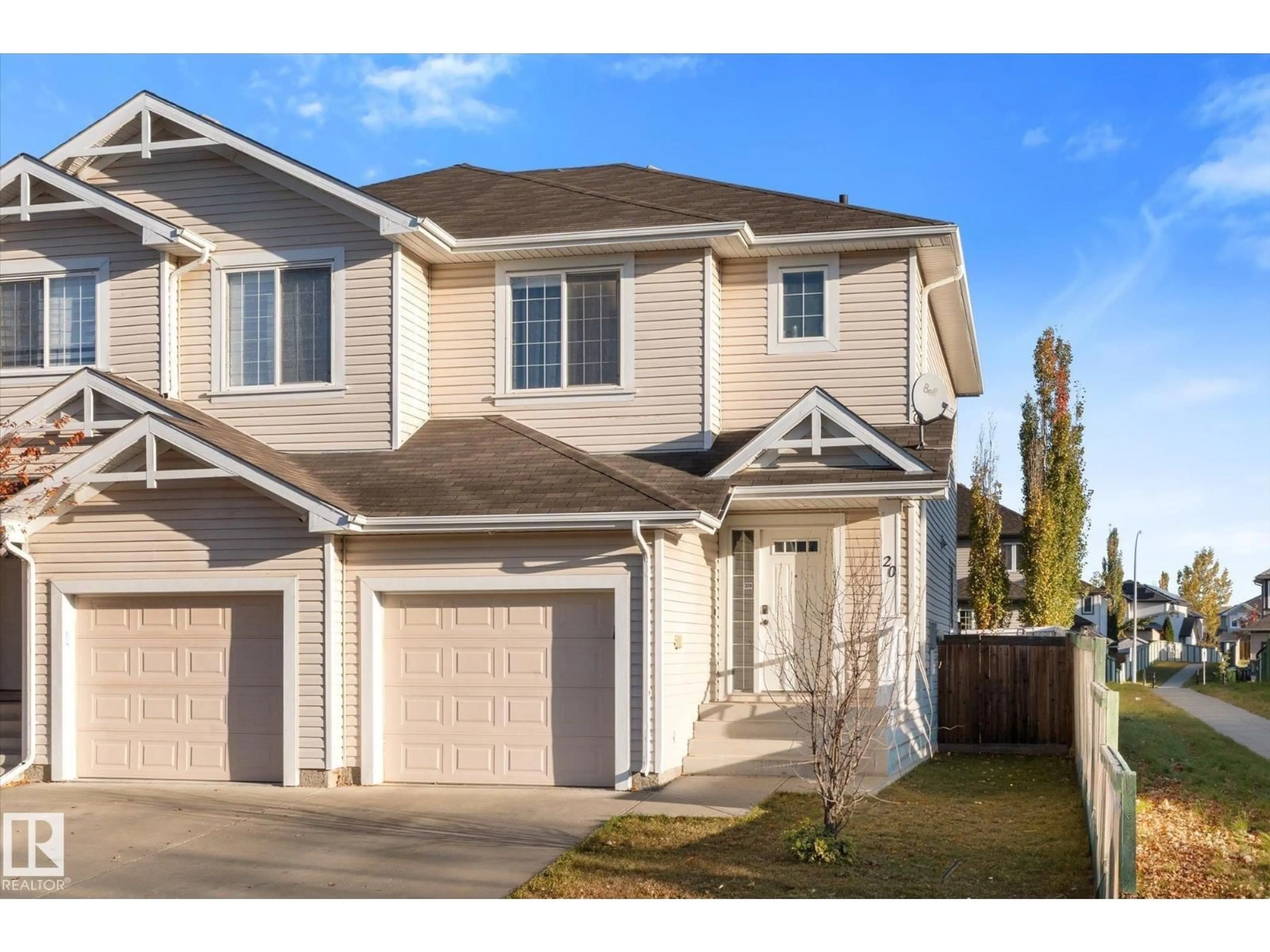 Home with vinyl exterior material, street for 20 CARAGANA WY, Fort Saskatchewan Alberta T8L0H8