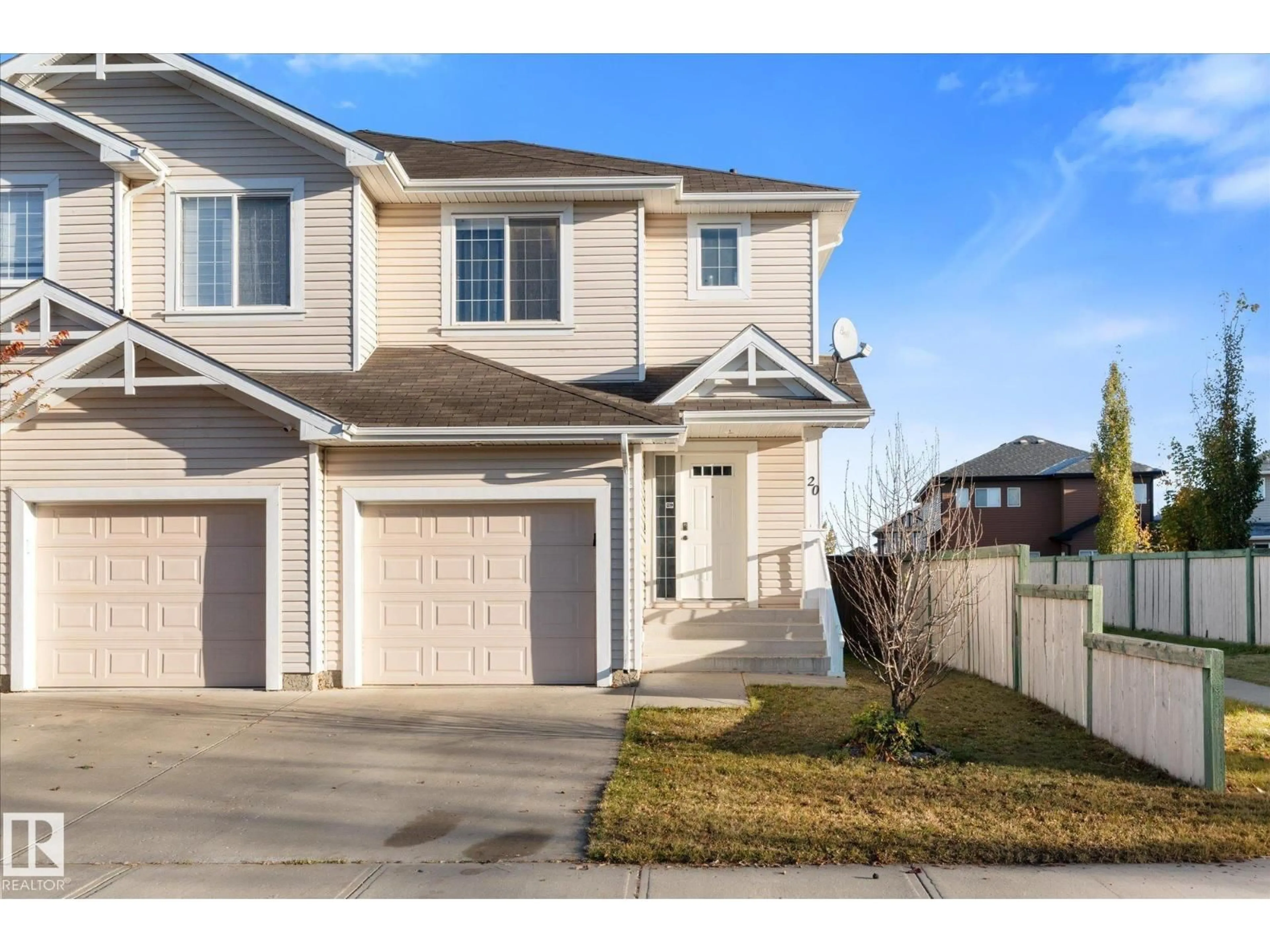 Home with vinyl exterior material, street for 20 CARAGANA WY, Fort Saskatchewan Alberta T8L0H8