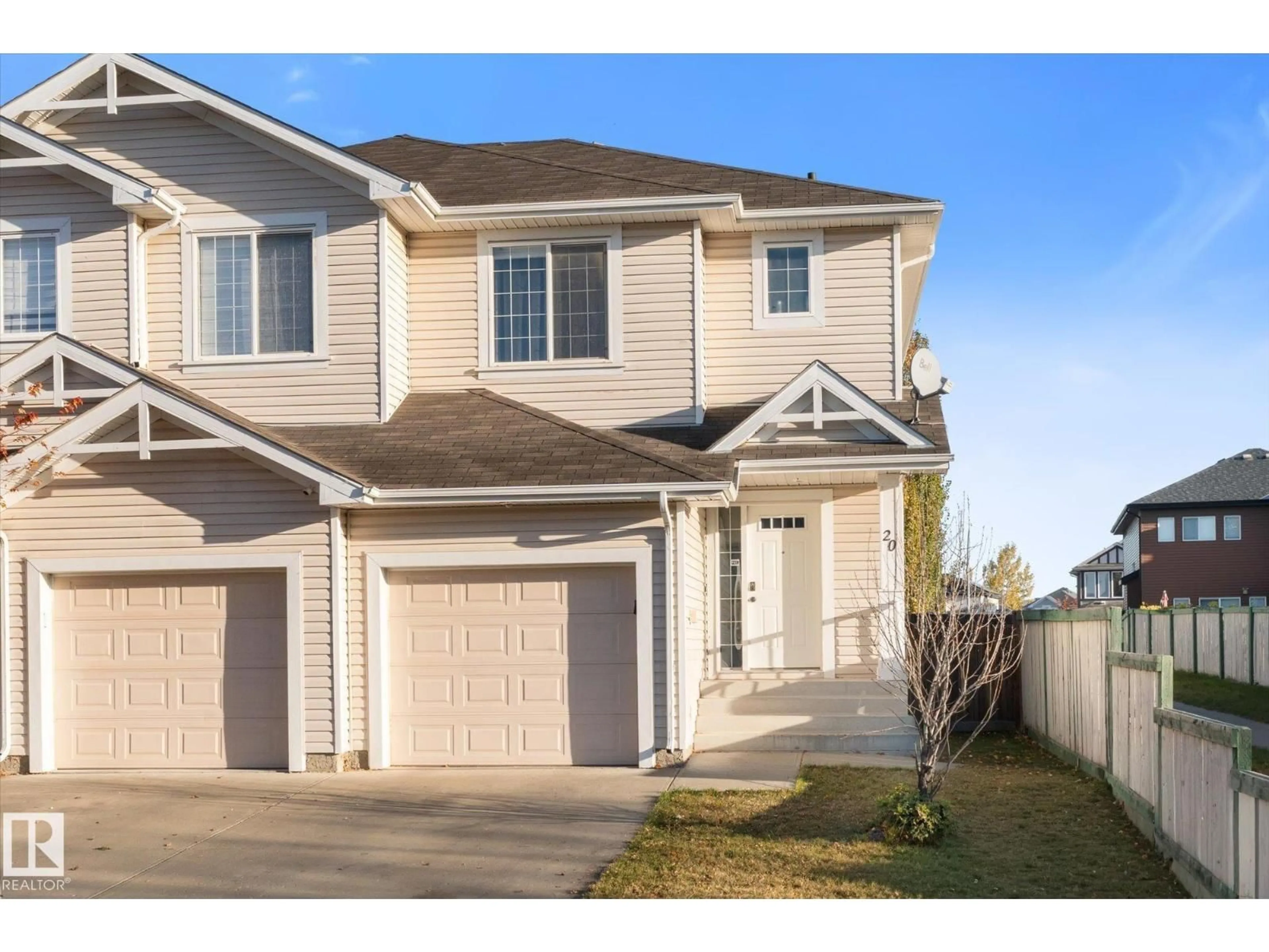 Home with vinyl exterior material, street for 20 CARAGANA WY, Fort Saskatchewan Alberta T8L0H8