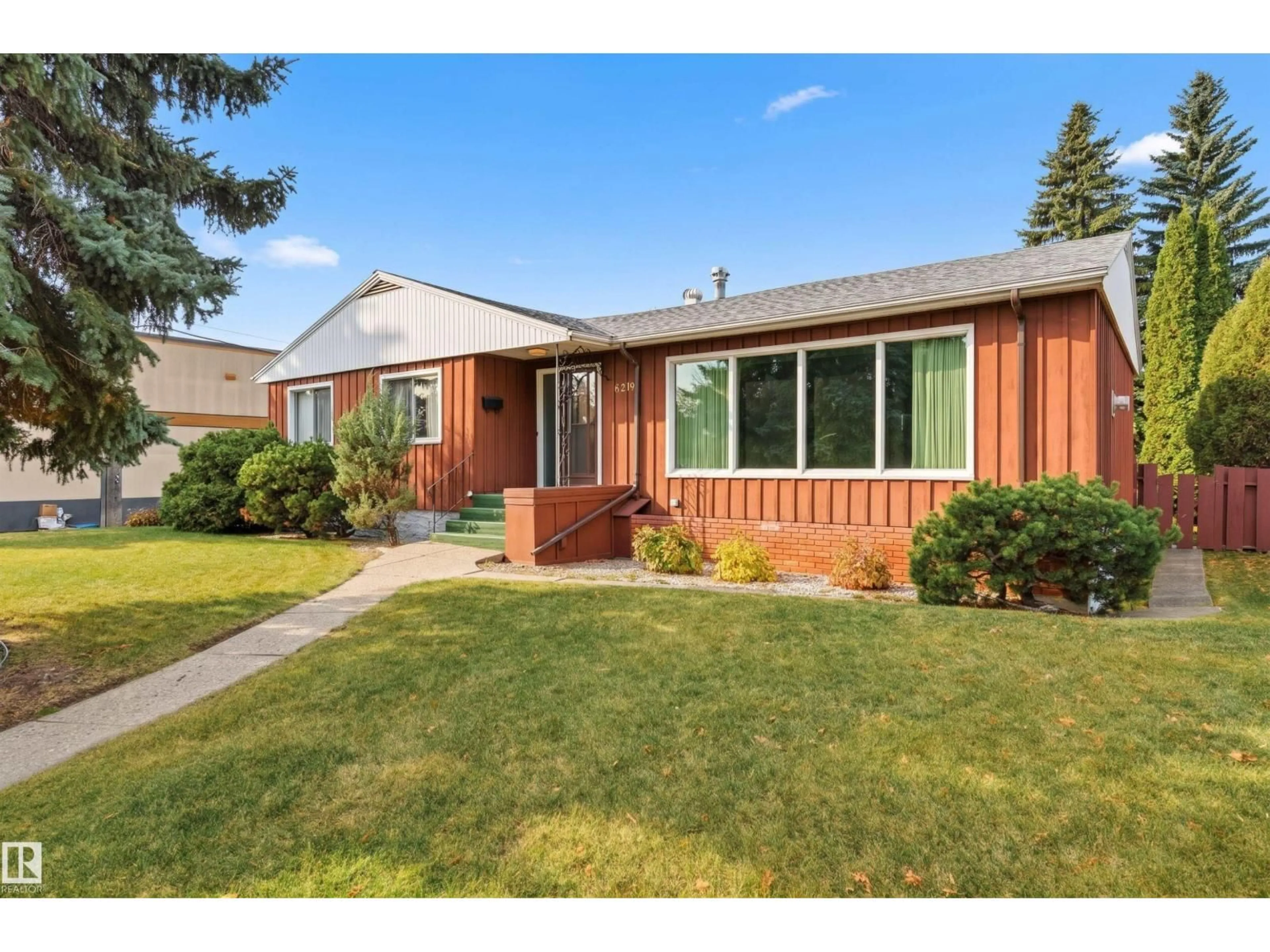 Home with vinyl exterior material, street for NW - 9708 142 ST, Edmonton Alberta T5N2N1