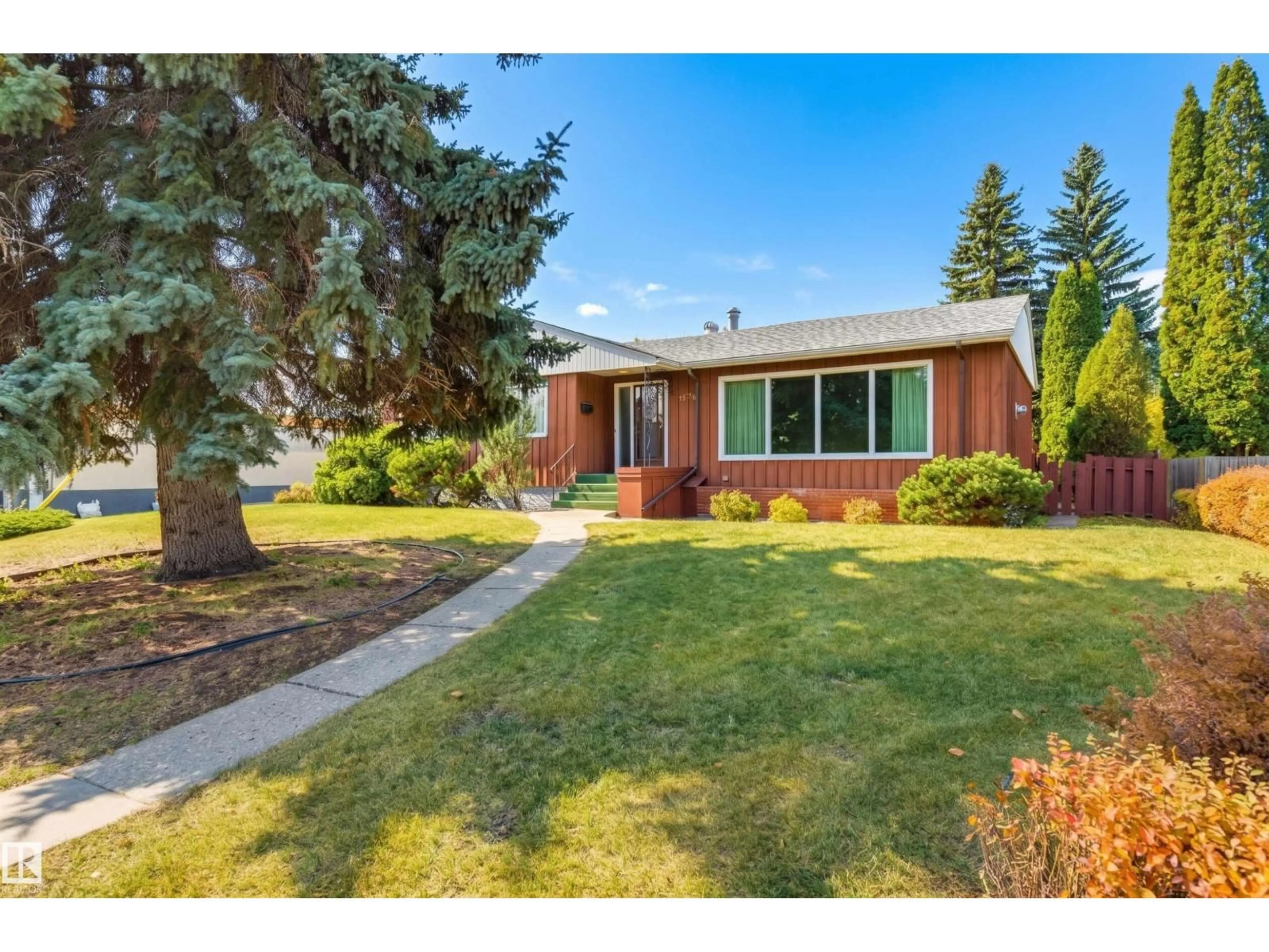 Home with brick exterior material, street for NW - 9708 142 ST, Edmonton Alberta T5N2N1