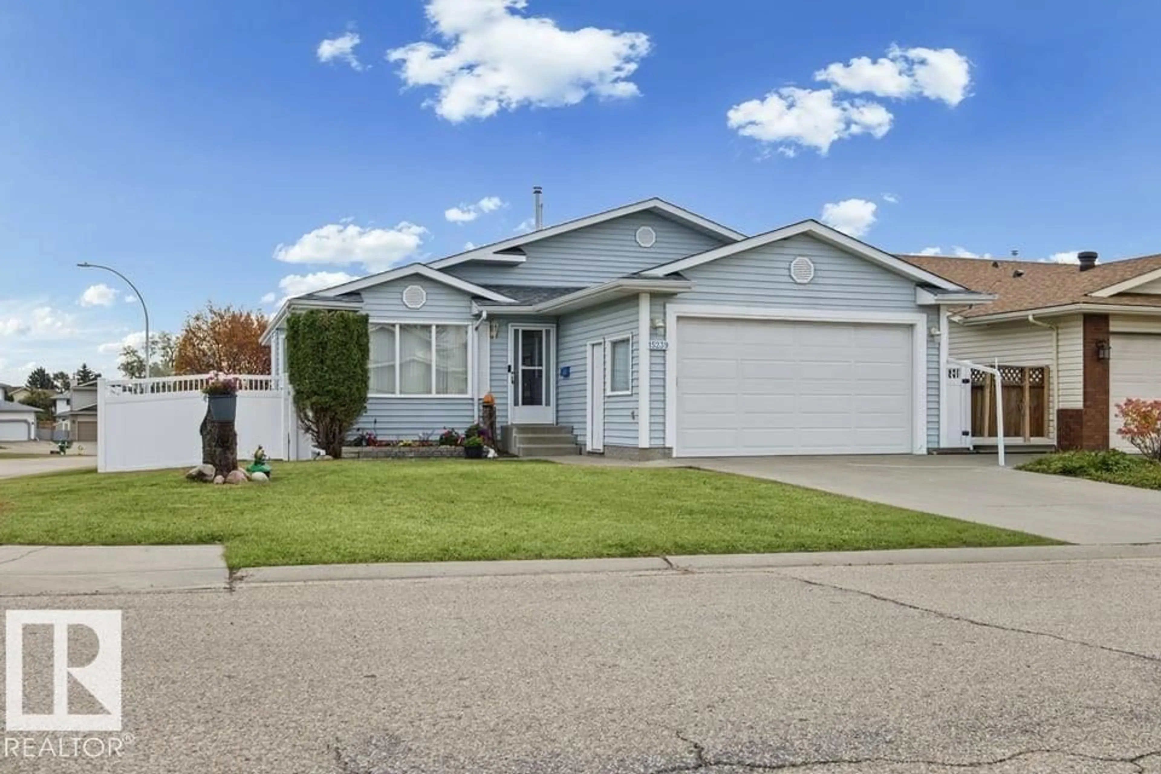 Home with vinyl exterior material, street for 15239 63 ST, Edmonton Alberta T5A4V8