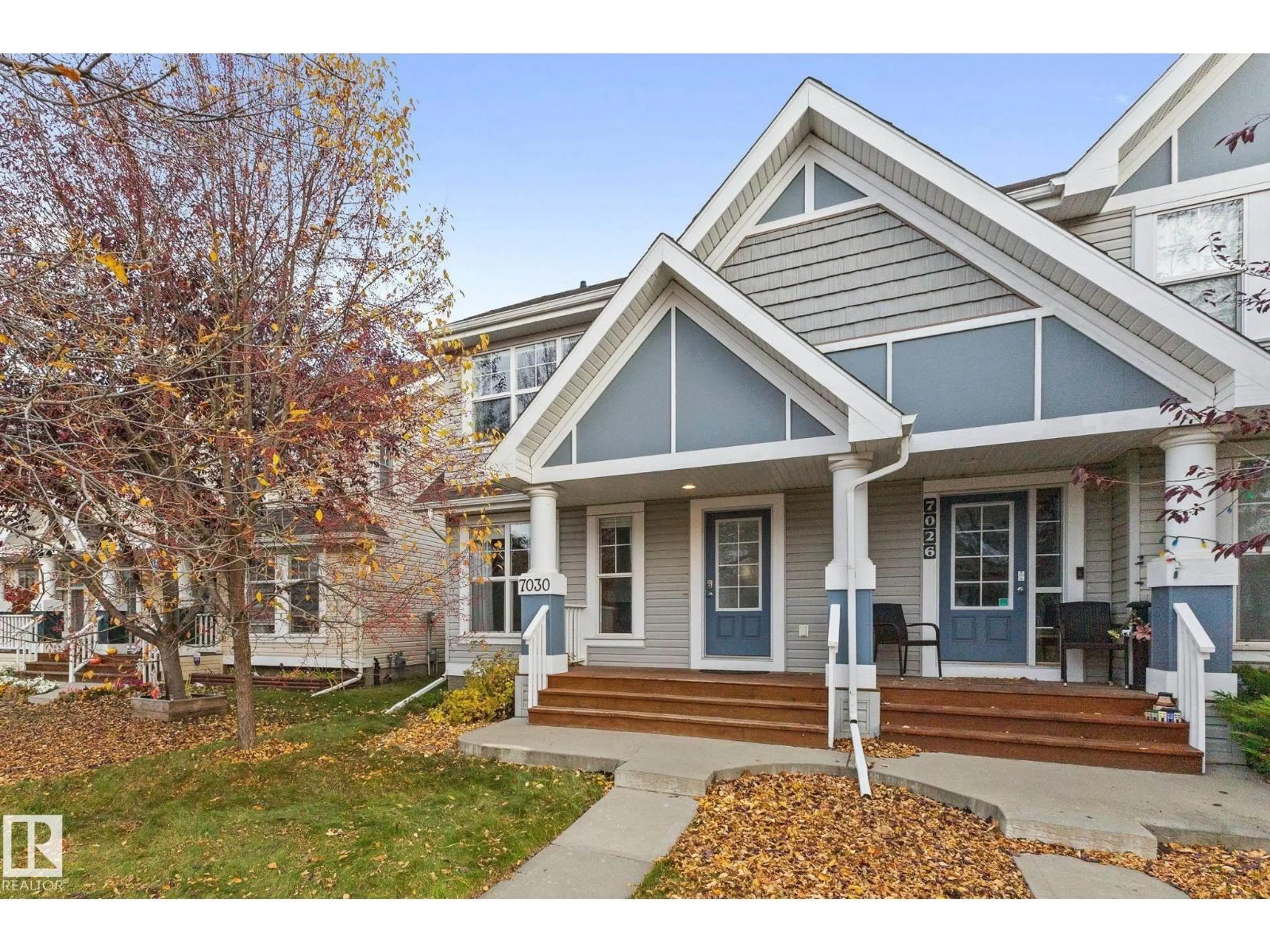 Home with vinyl exterior material, street for SW - 7030 21A AV, Edmonton Alberta T6X0T7