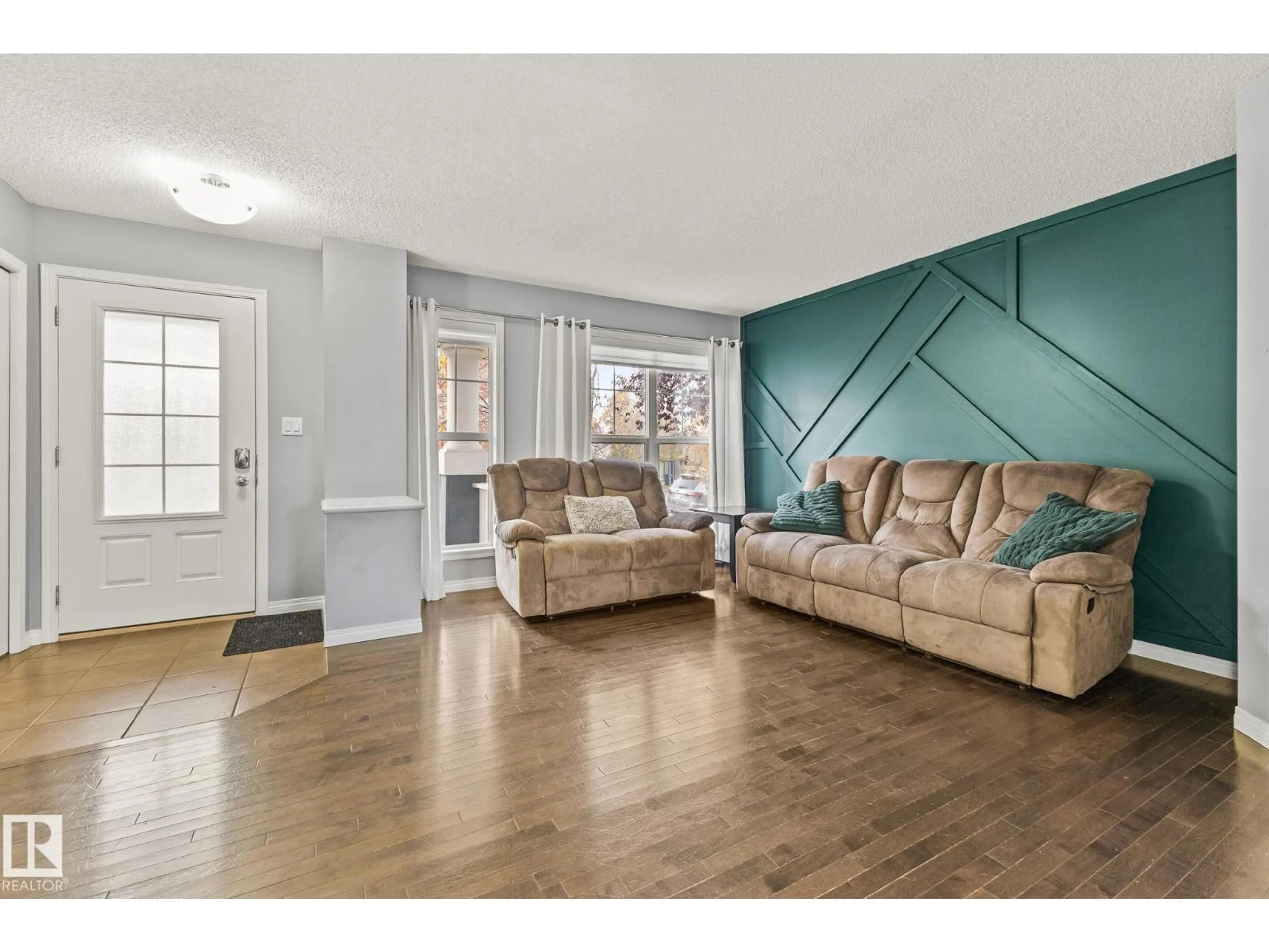 Living room with furniture, unknown for SW - 7030 21A AV, Edmonton Alberta T6X0T7