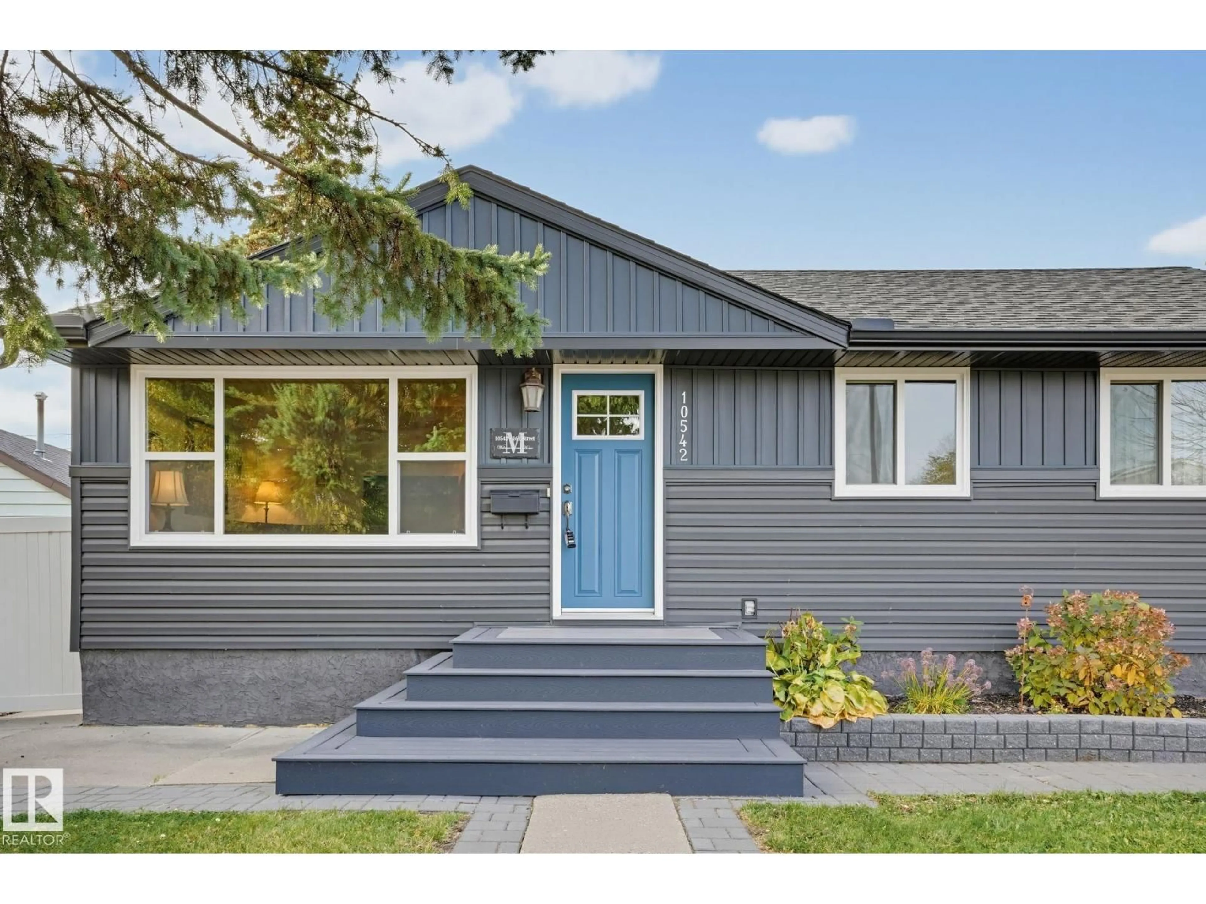 Home with vinyl exterior material, street for NW - 10542 161 ST, Edmonton Alberta T5P3J7