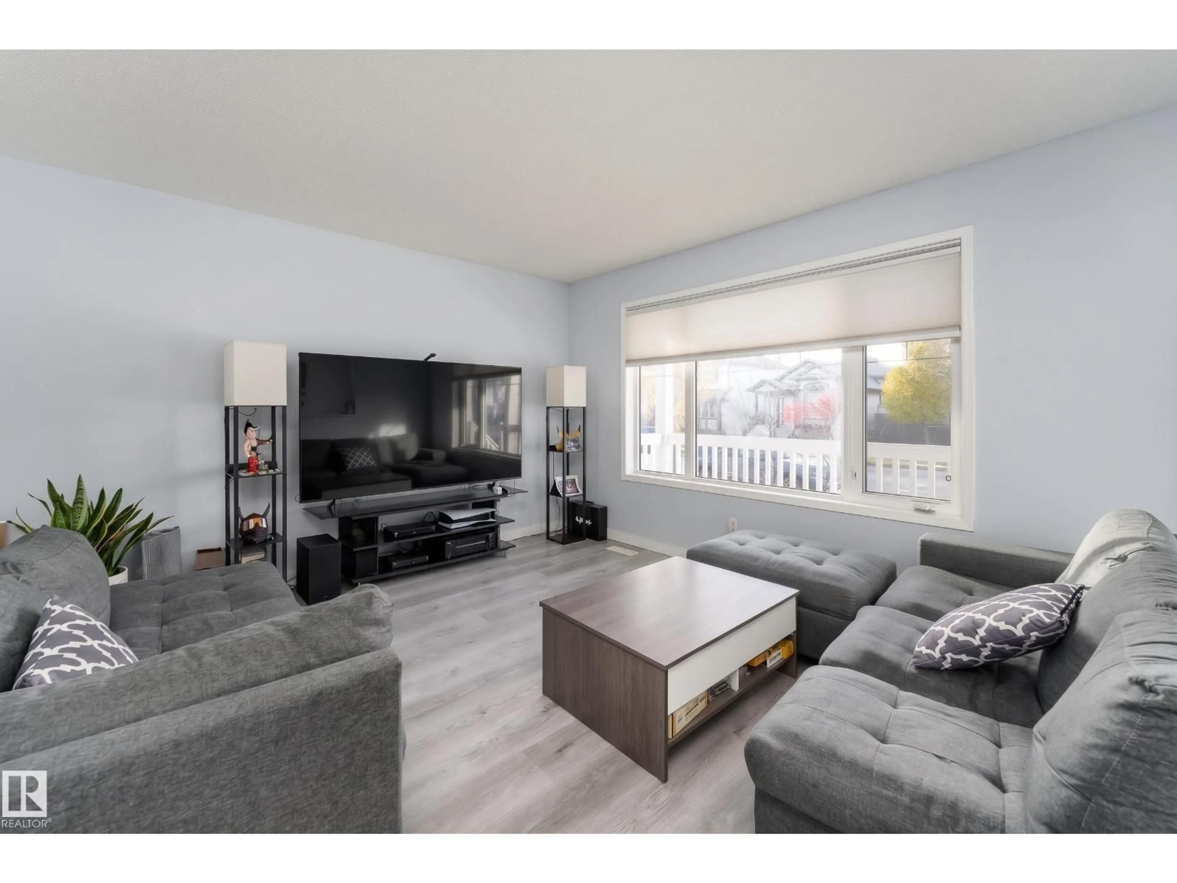 Living room with furniture, wood/laminate floor for 112 BRINTNELL BV, Edmonton Alberta T5Y0C3